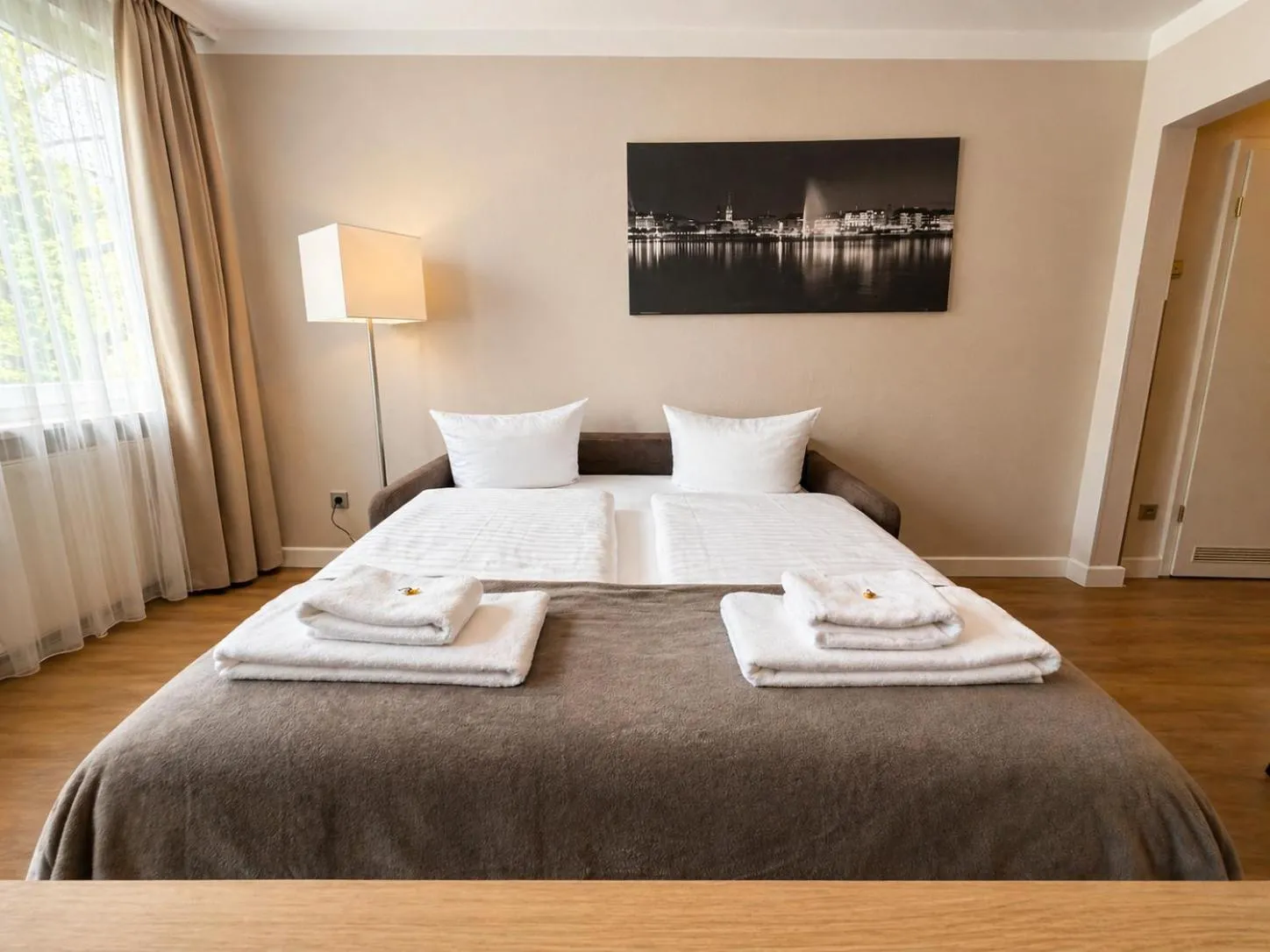 Bed in Hotel Wania