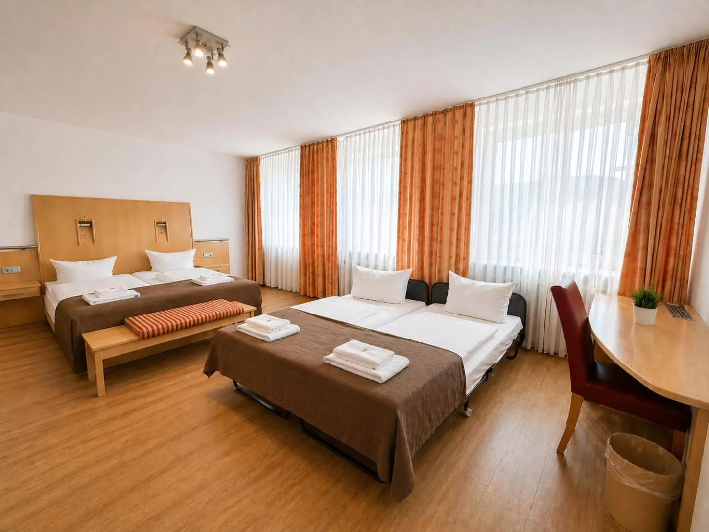 Bed in Hotel Wania