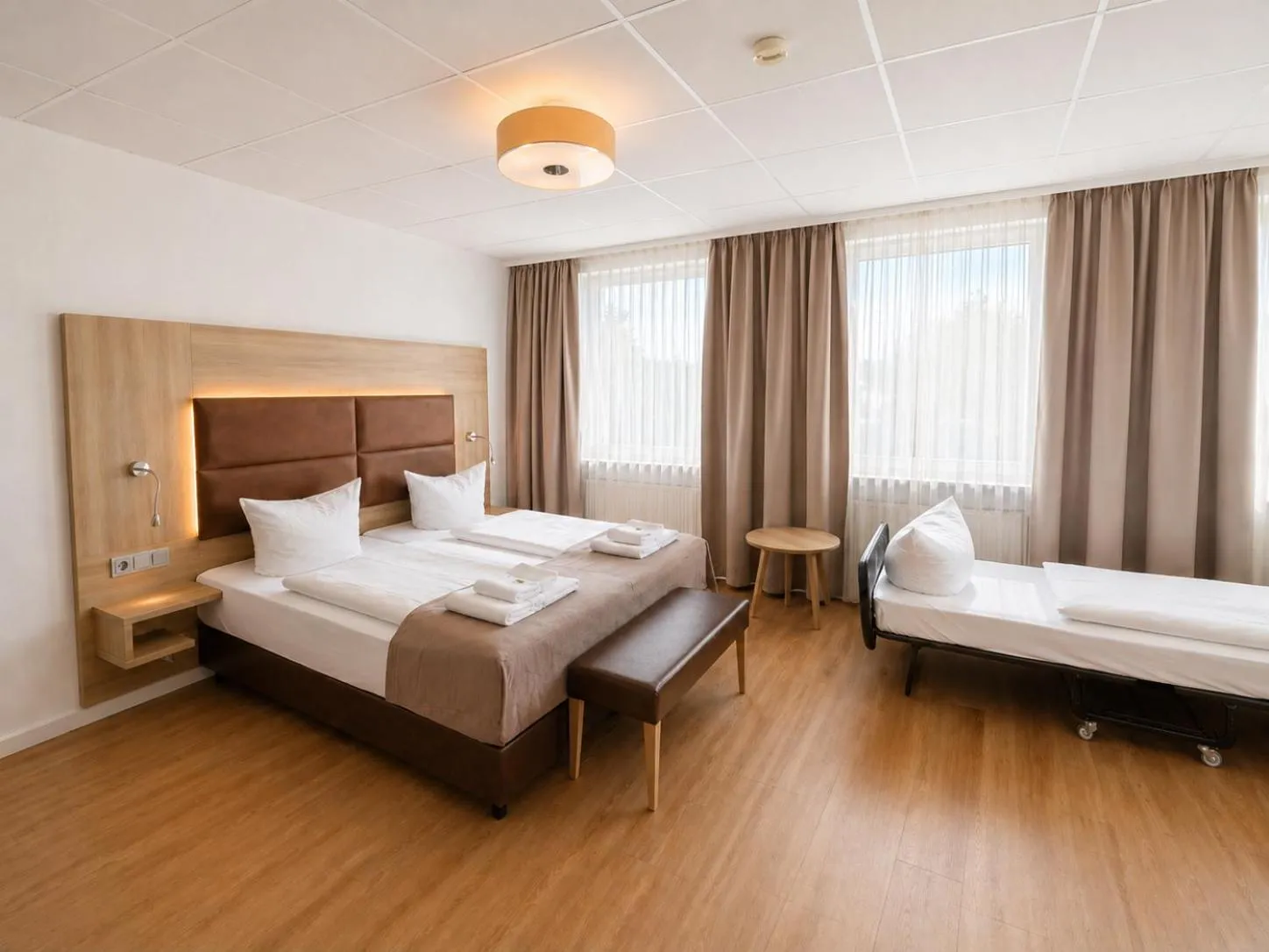 Bed in Hotel Wania
