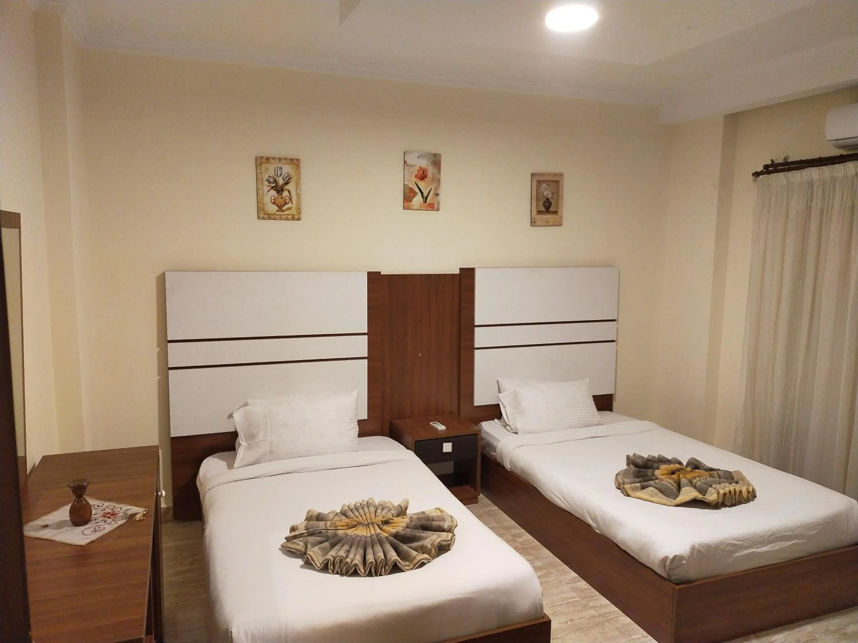 Bed in 26th of July Apartments