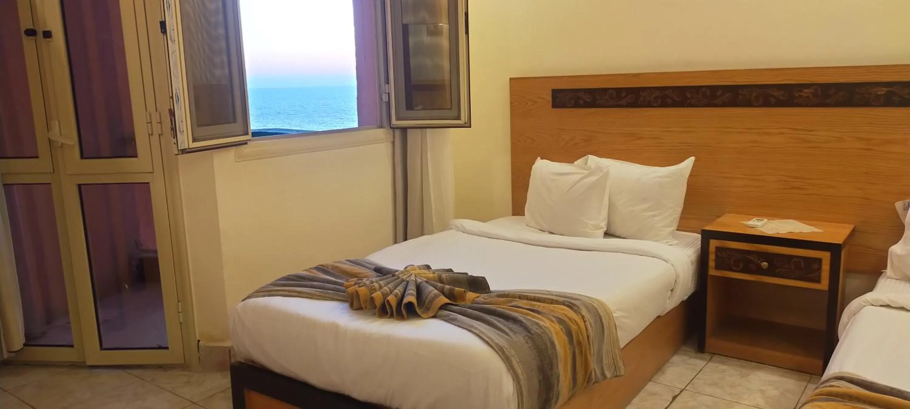 Bed in 26th of July Apartments