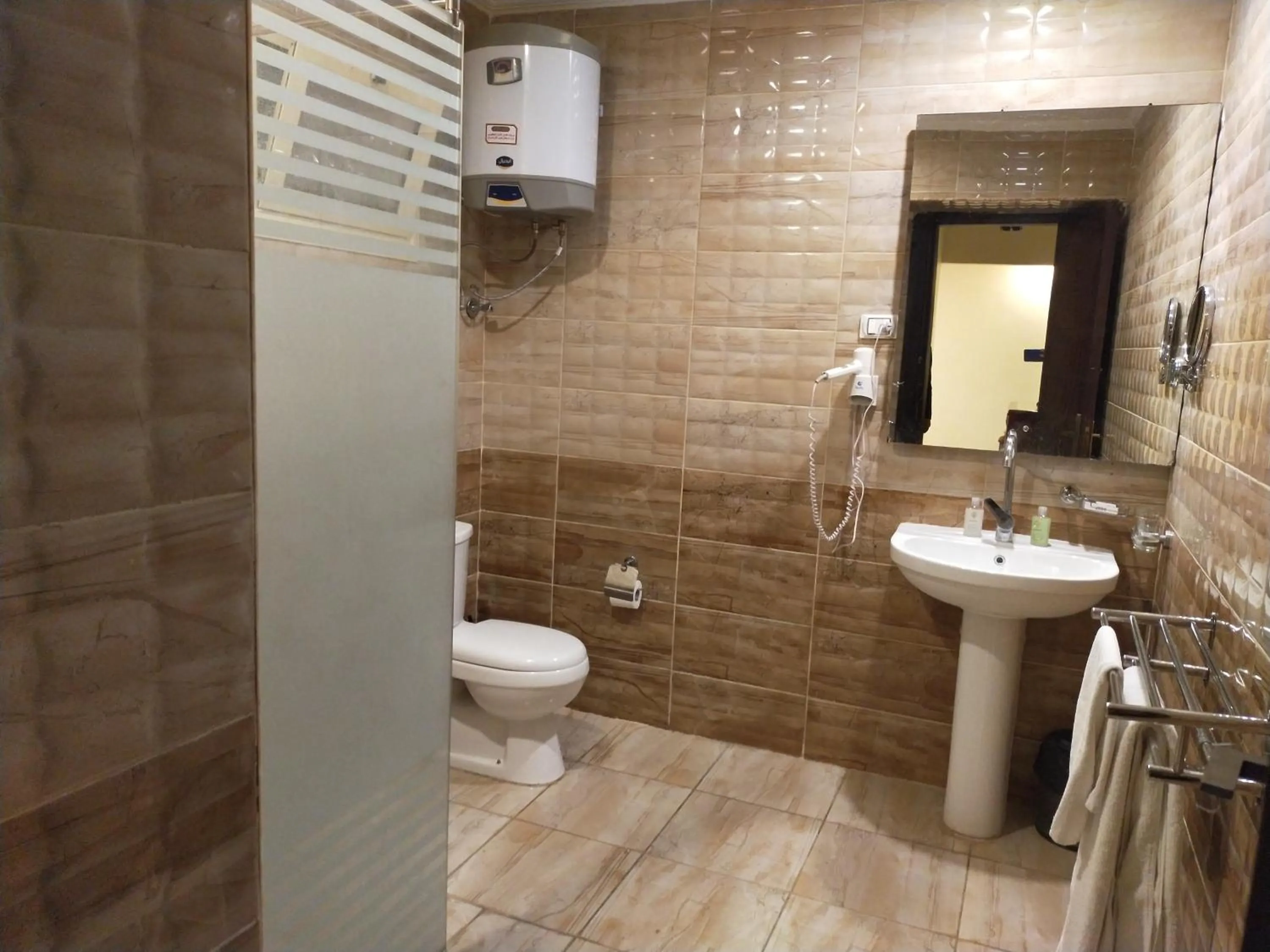 Bathroom in 26th of July Apartments