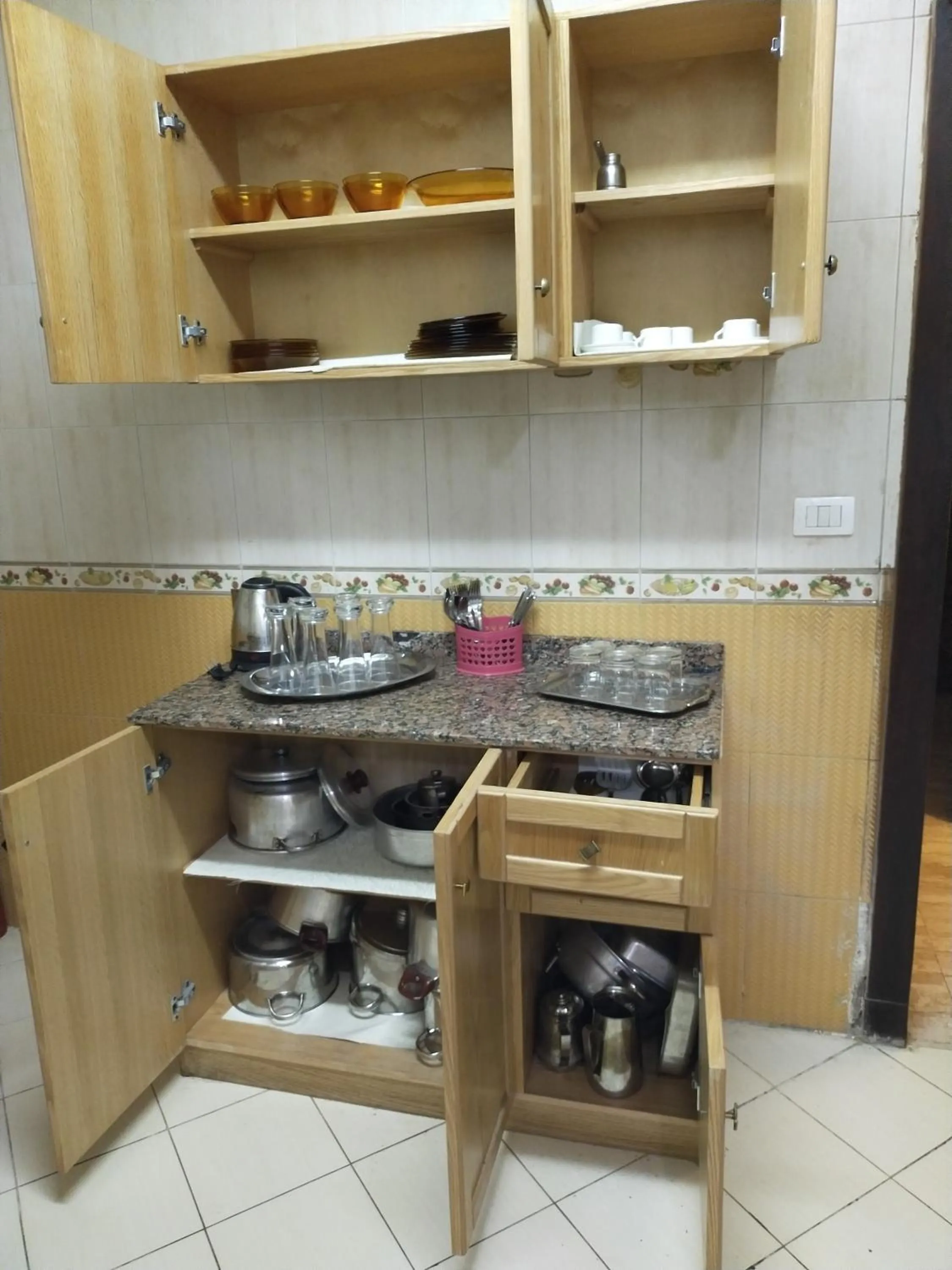 Kitchen or kitchenette in 26th of July Apartments