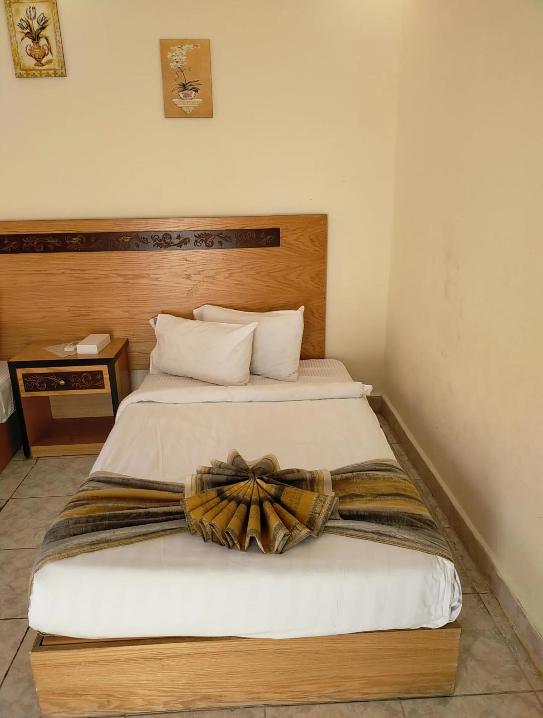 Bed in 26th of July Apartments