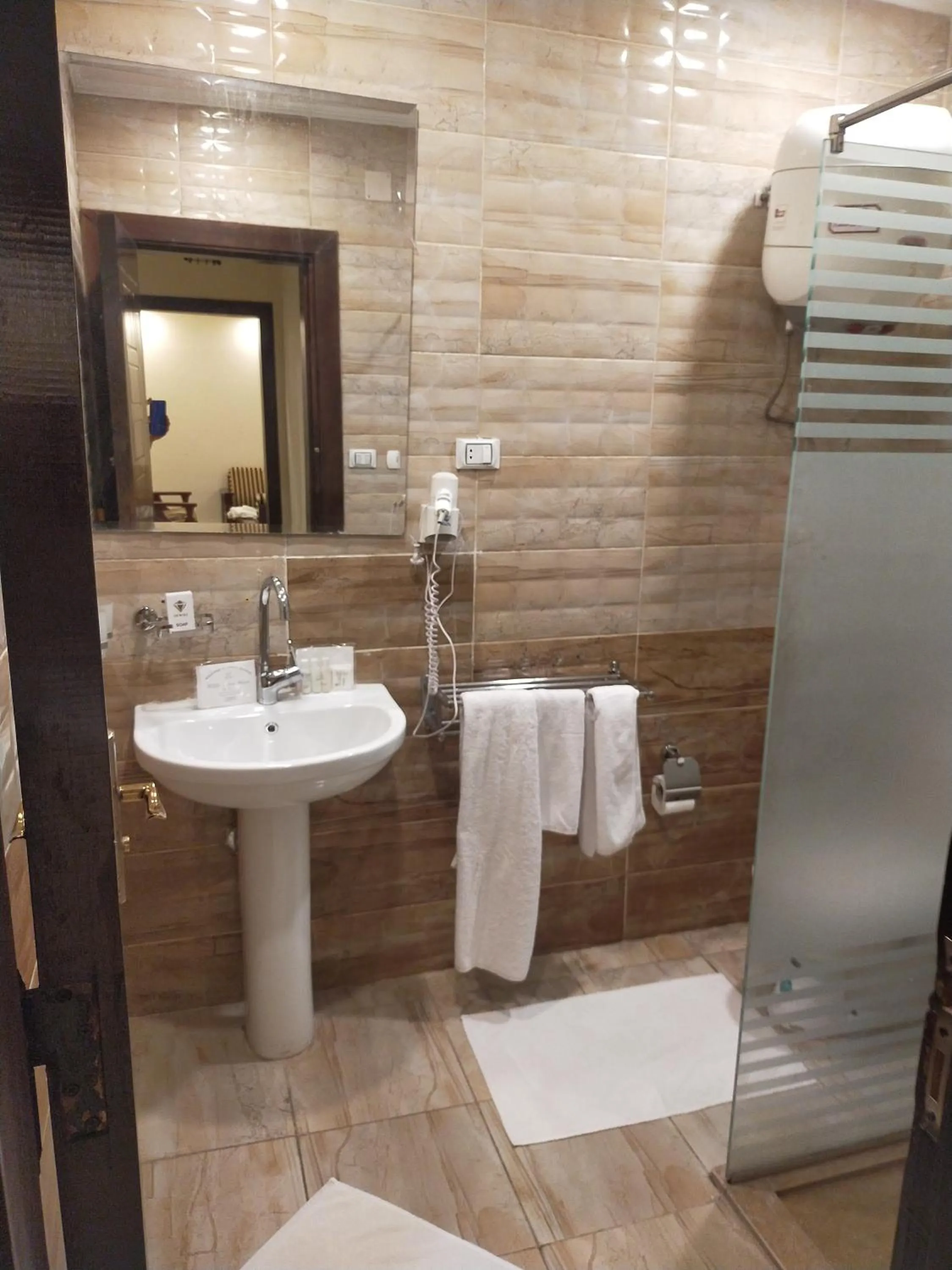 Bathroom in 26th of July Apartments