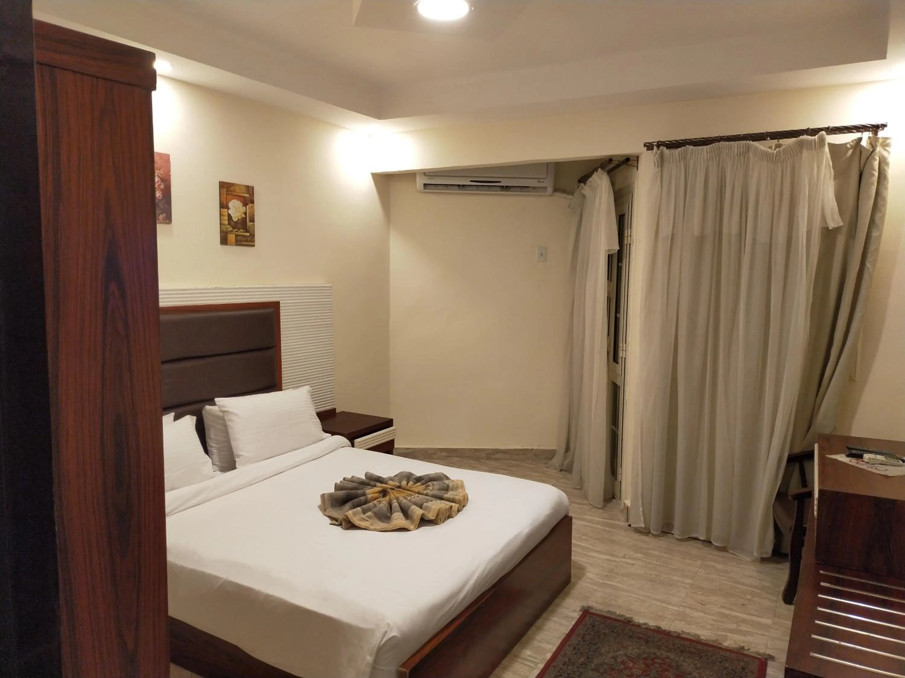 Bed in 26th of July Apartments