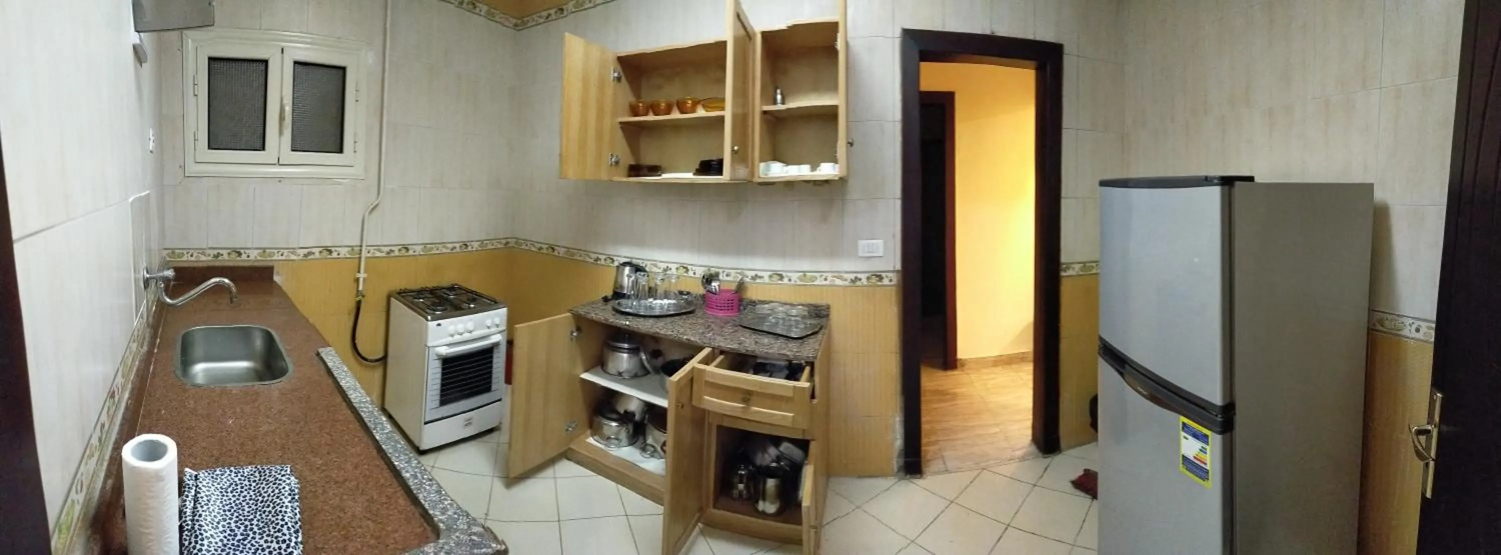 Kitchen or kitchenette in 26th of July Apartments