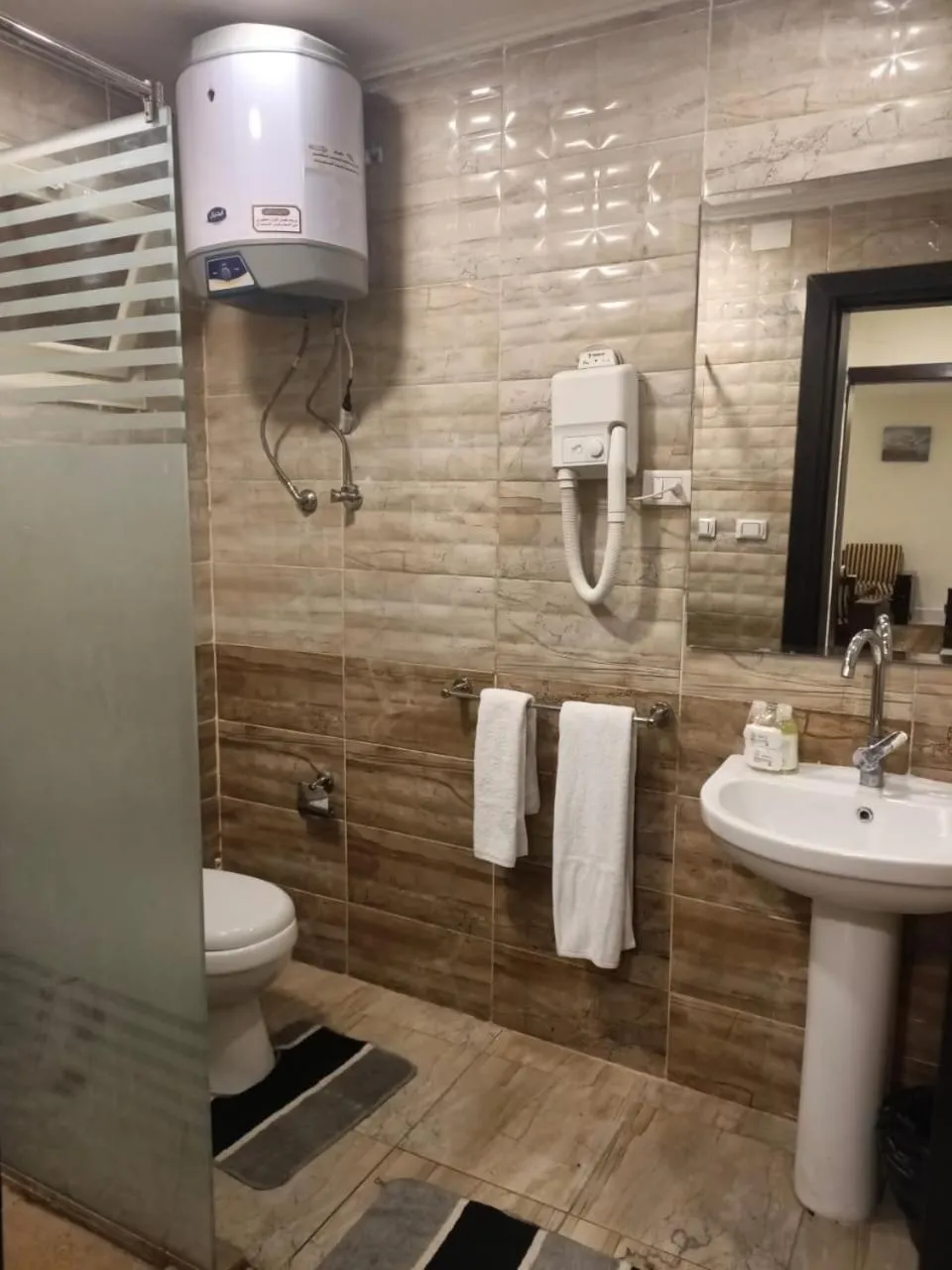 Bathroom in 26th of July Apartments