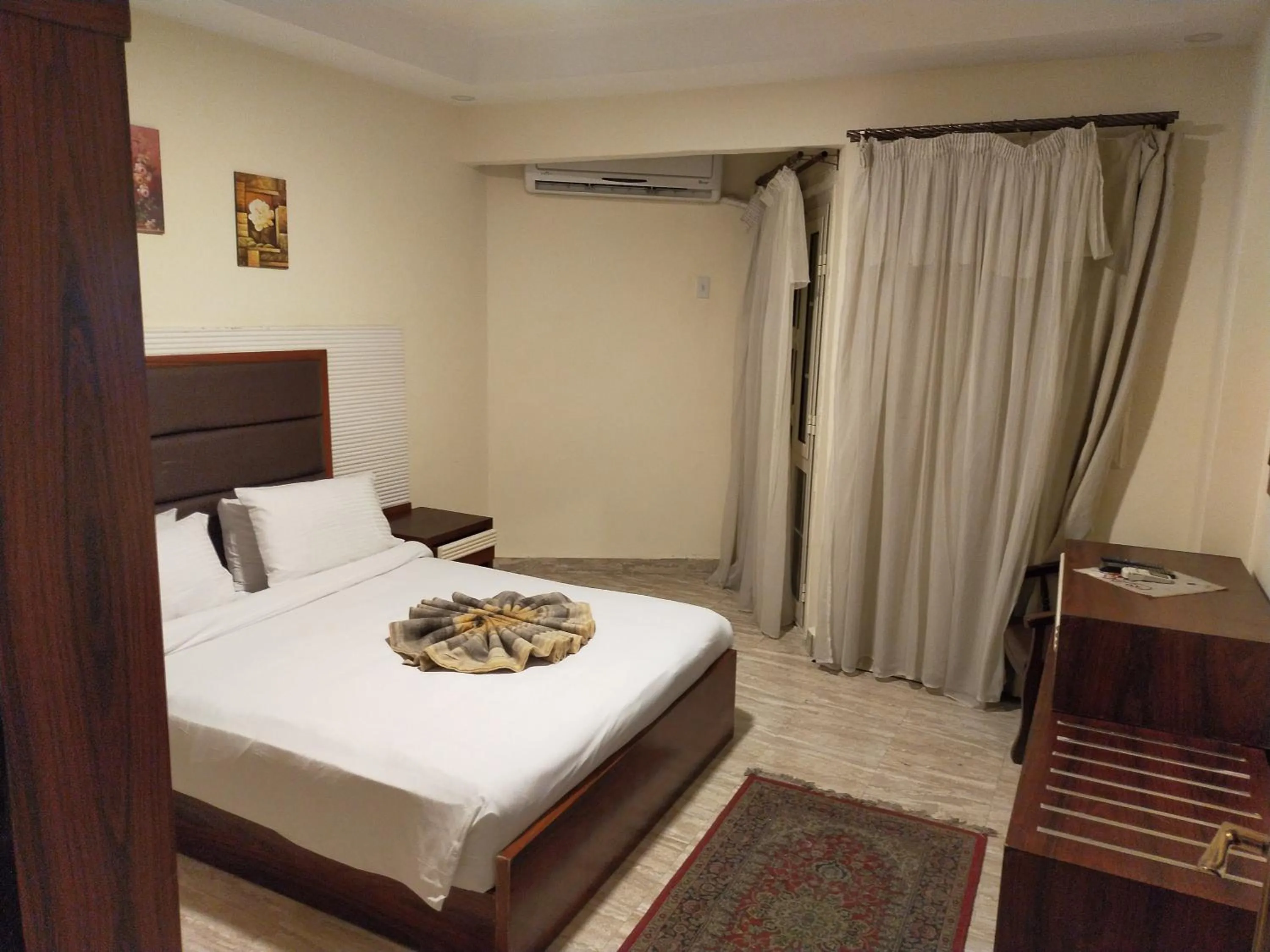 Bed in 26th of July Apartments