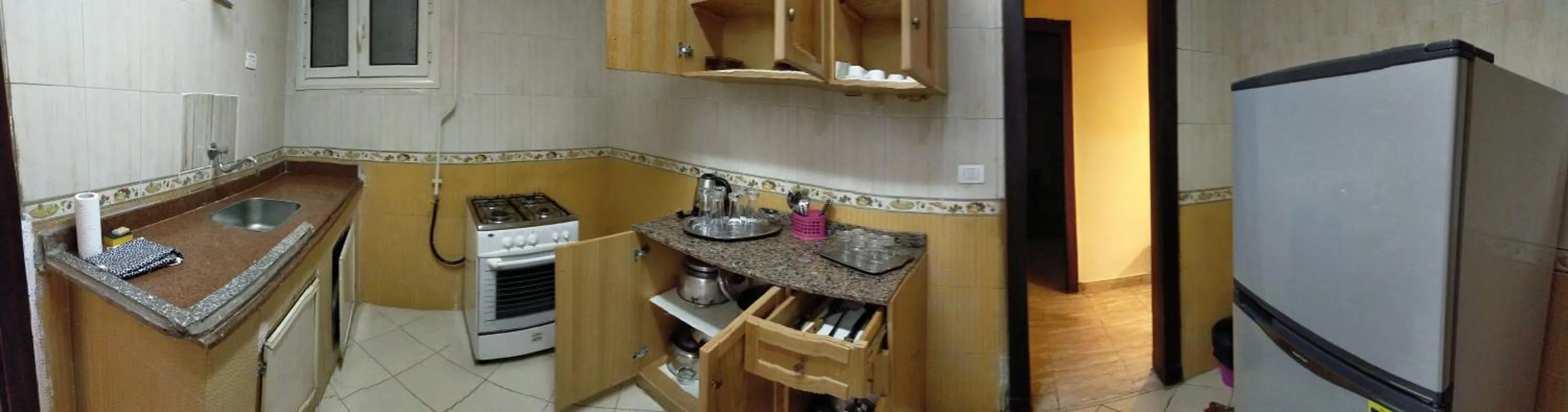 Kitchen or kitchenette in 26th of July Apartments