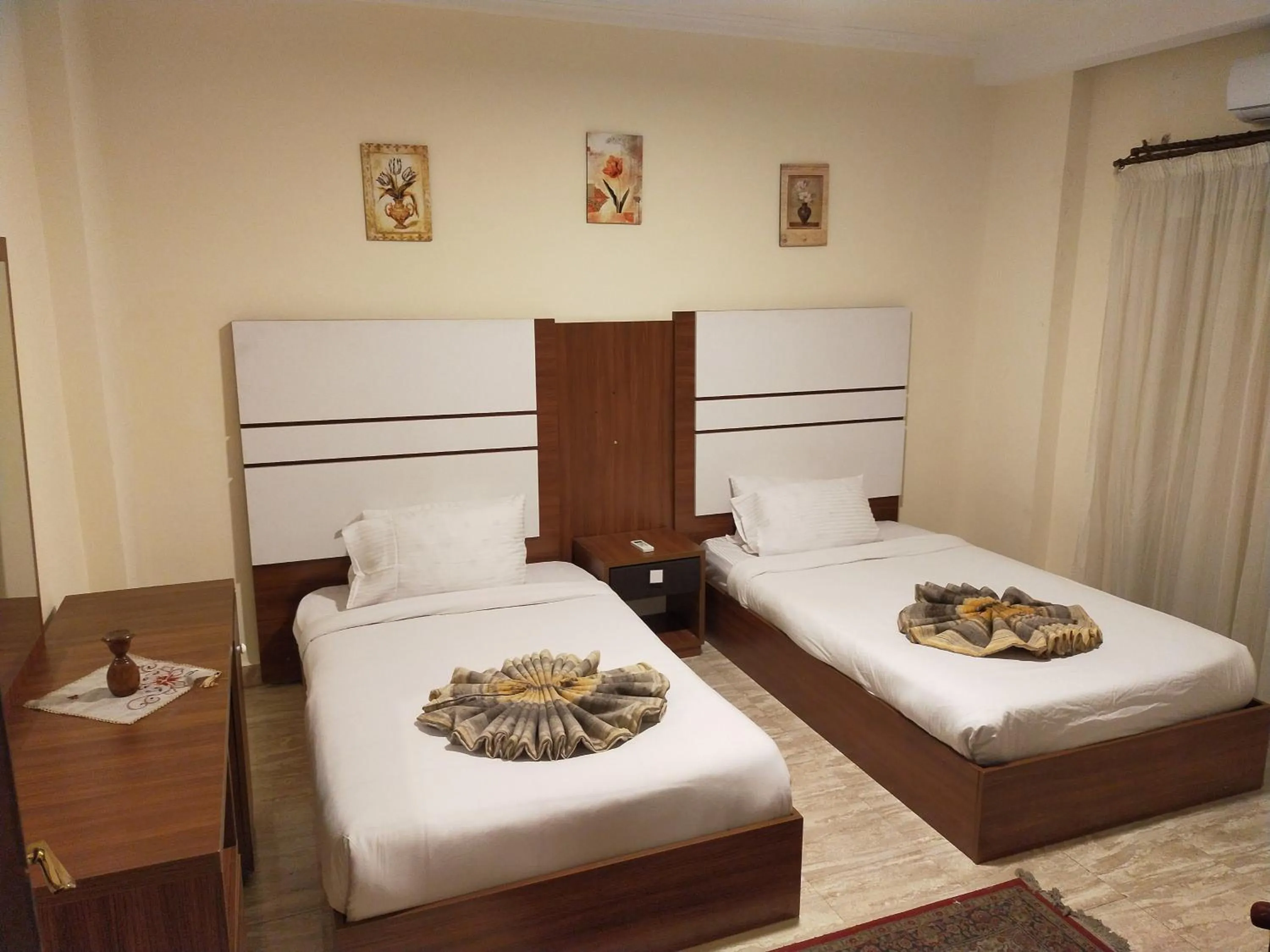 Bed in 26th of July Apartments