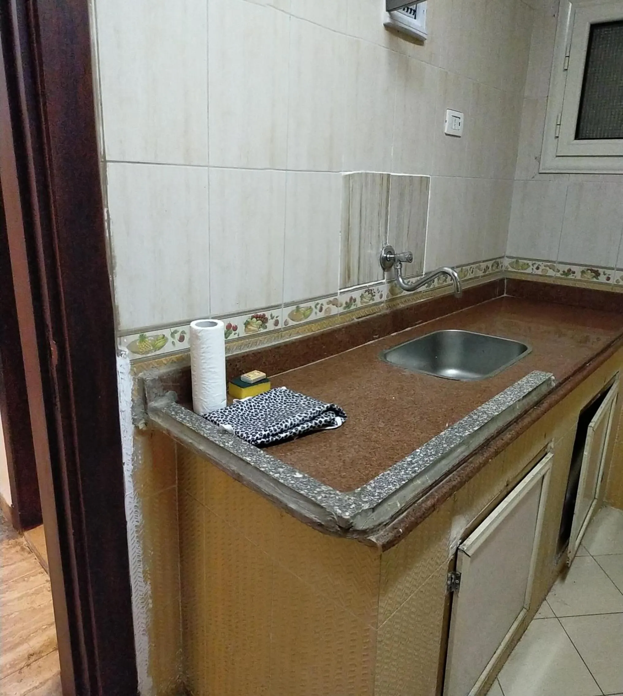 Kitchen or kitchenette in 26th of July Apartments
