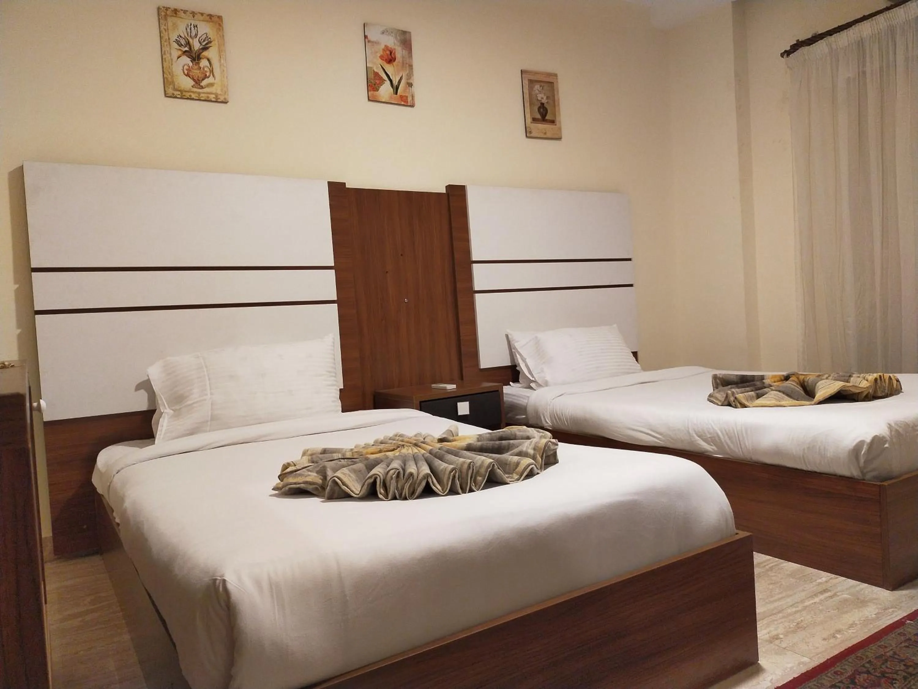 Bed in 26th of July Apartments