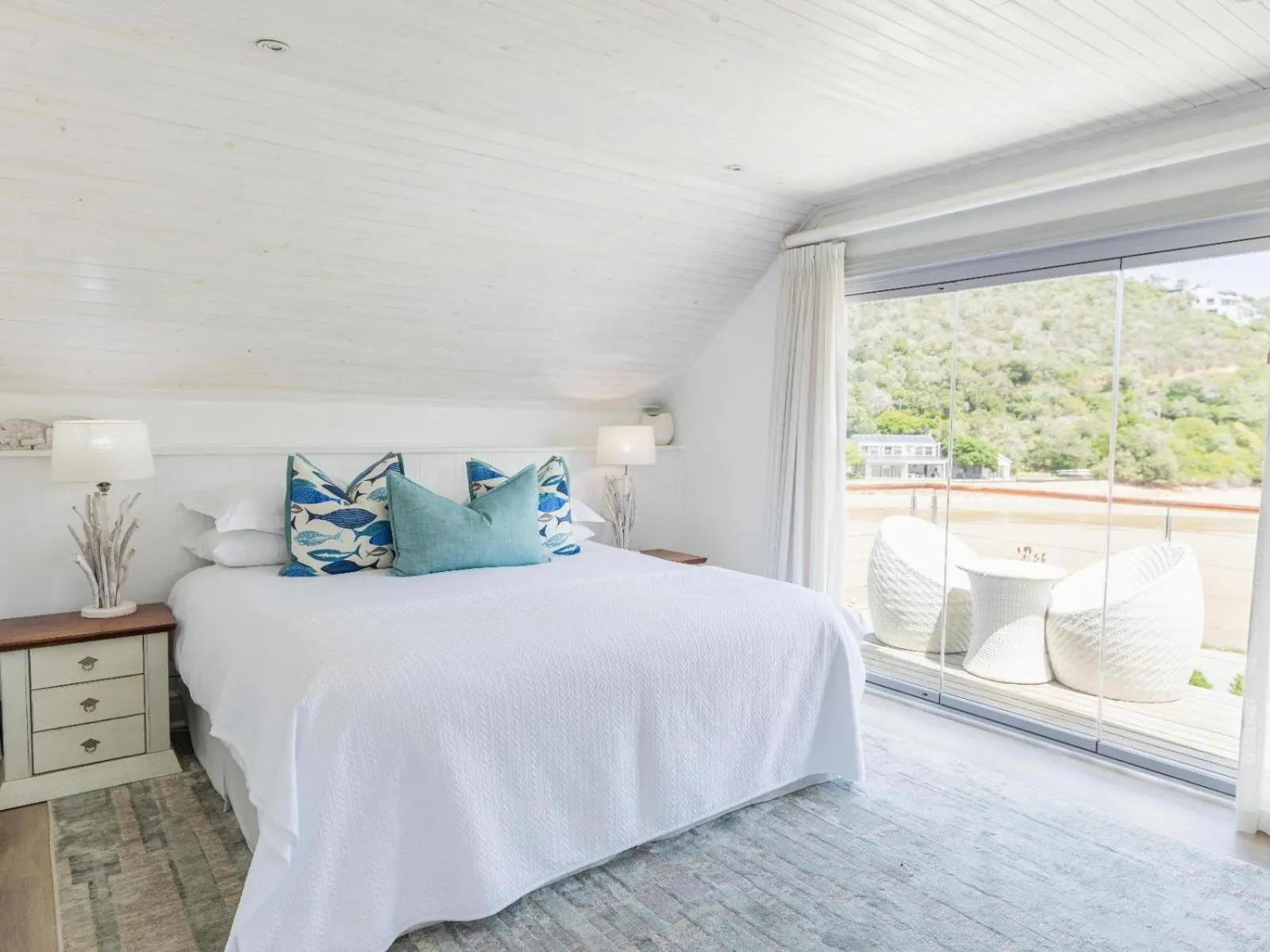 Bed in Amanzi Island Boutique Hotel