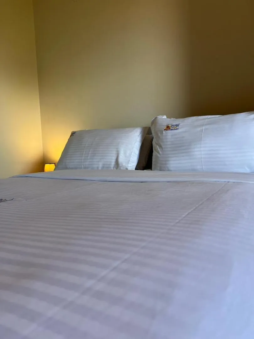 Bed in Hotel Royal Nest Entebbe