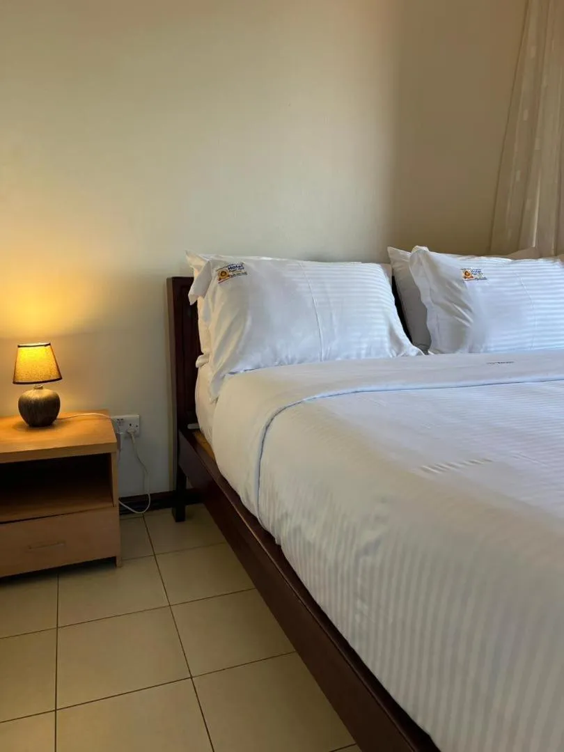Bed in Hotel Royal Nest Entebbe