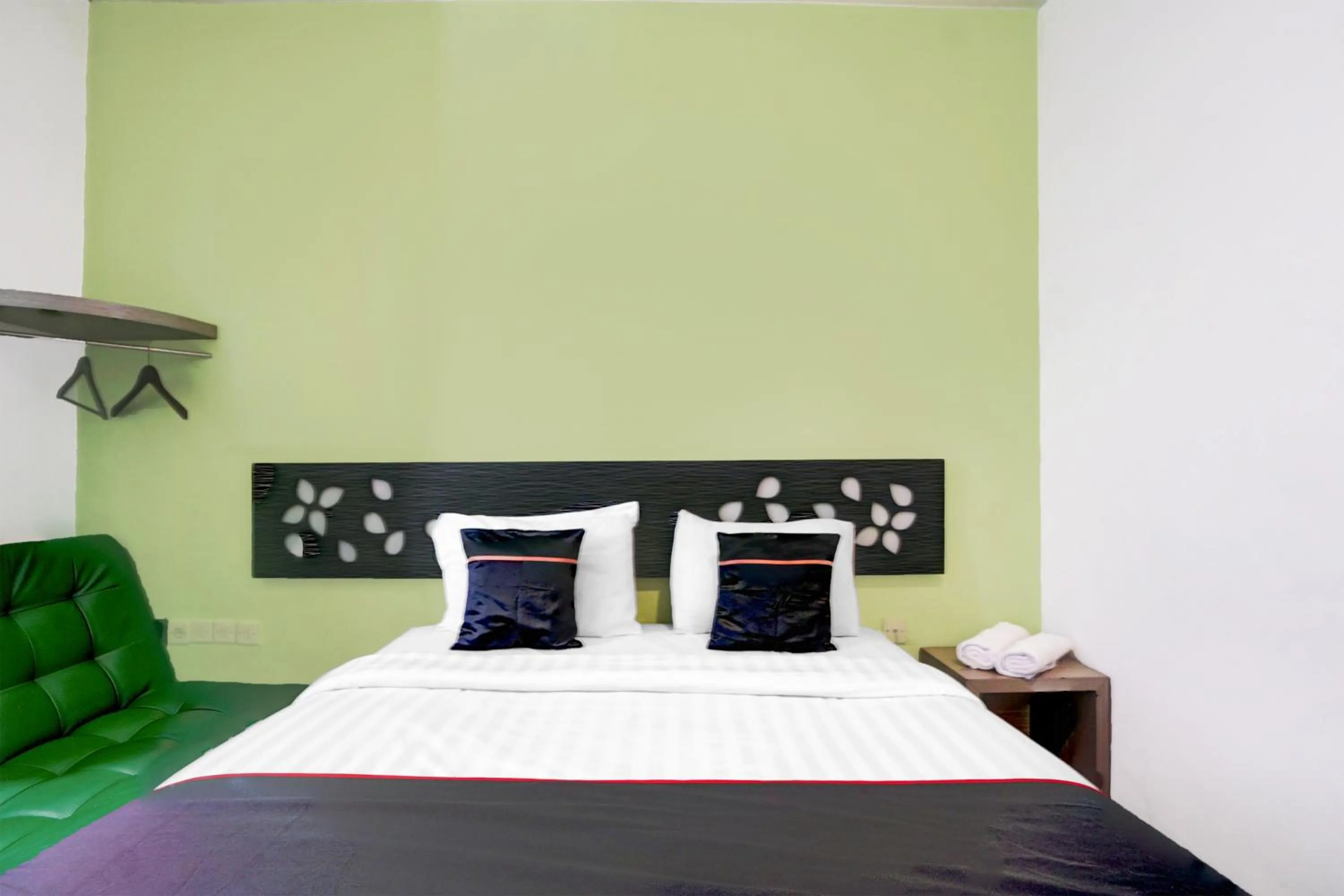 Bed in Hotel O Symphony Homestay Tlogomas