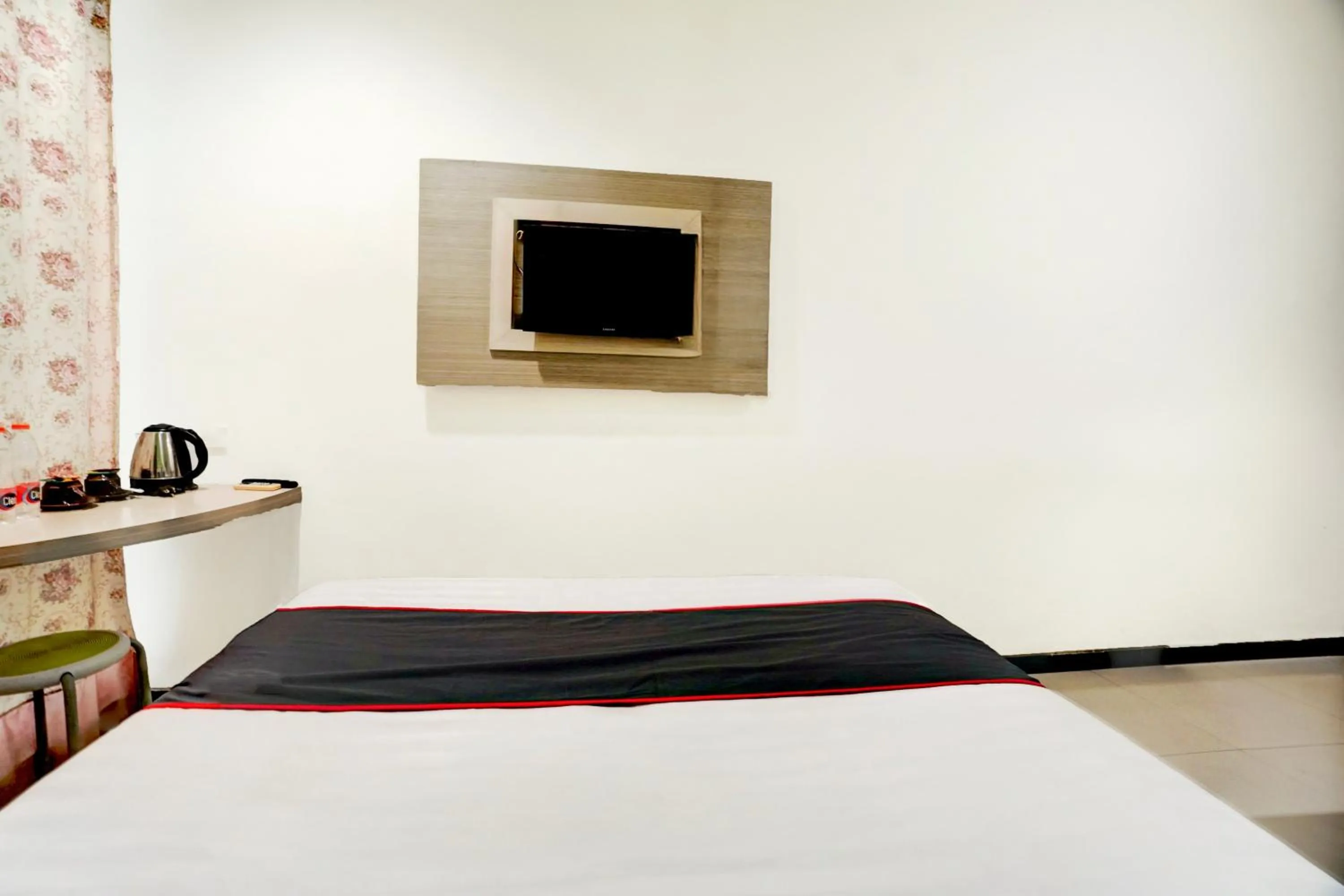 Bed in Hotel O Symphony Homestay Tlogomas