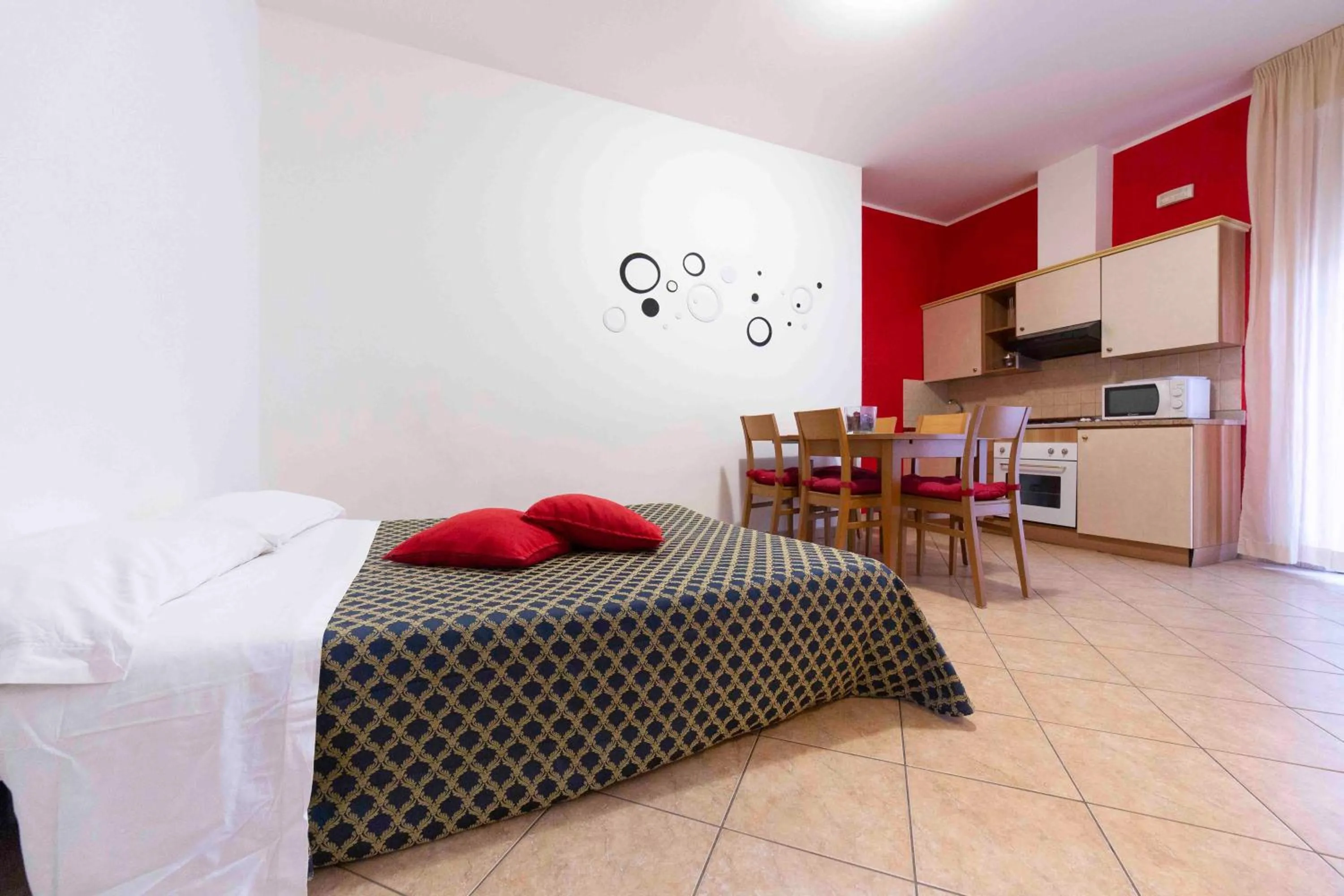 Kitchen or kitchenette, Bed in Residenza Melucci