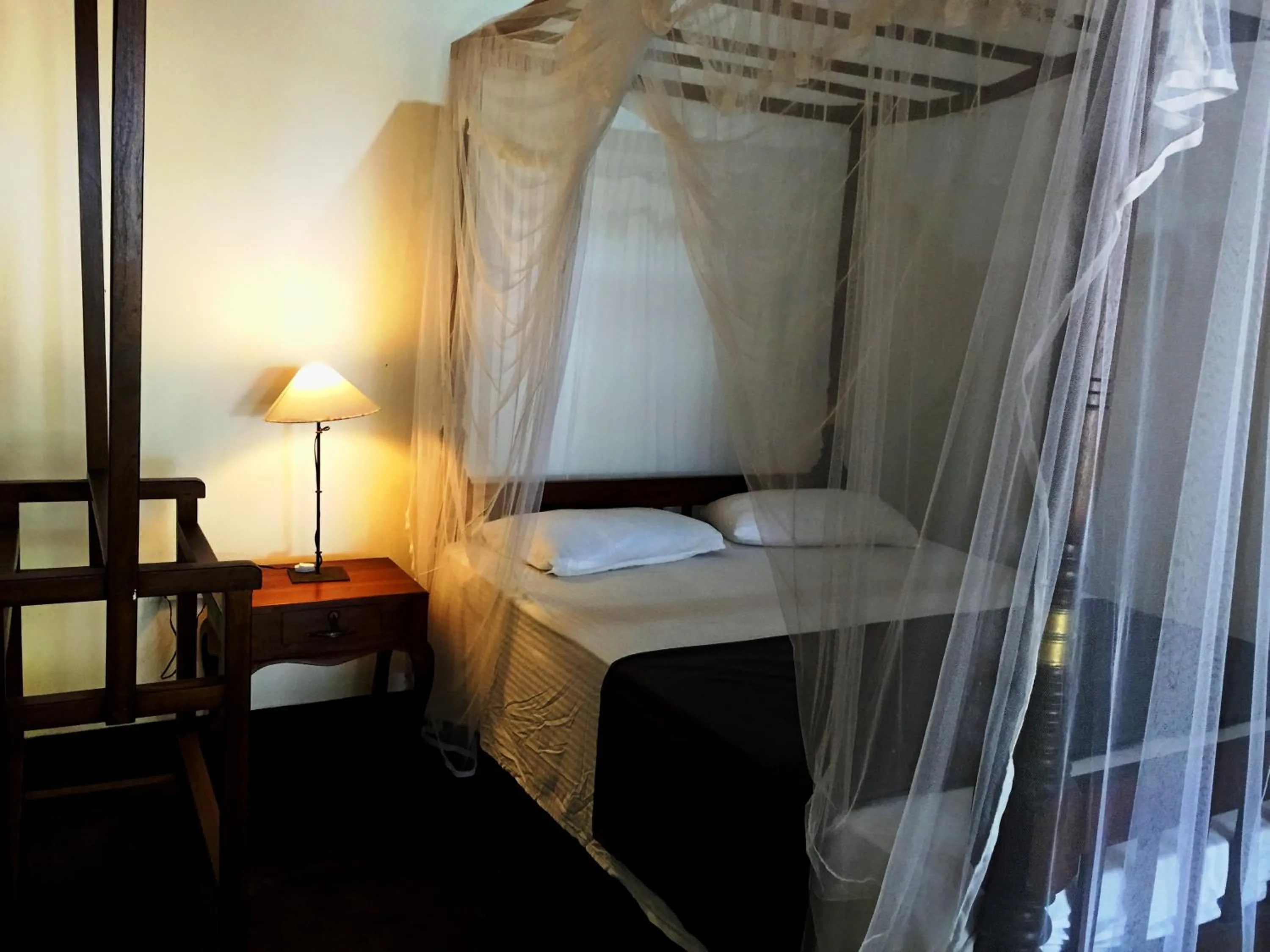 Bed in Shehani Beach Bungalow