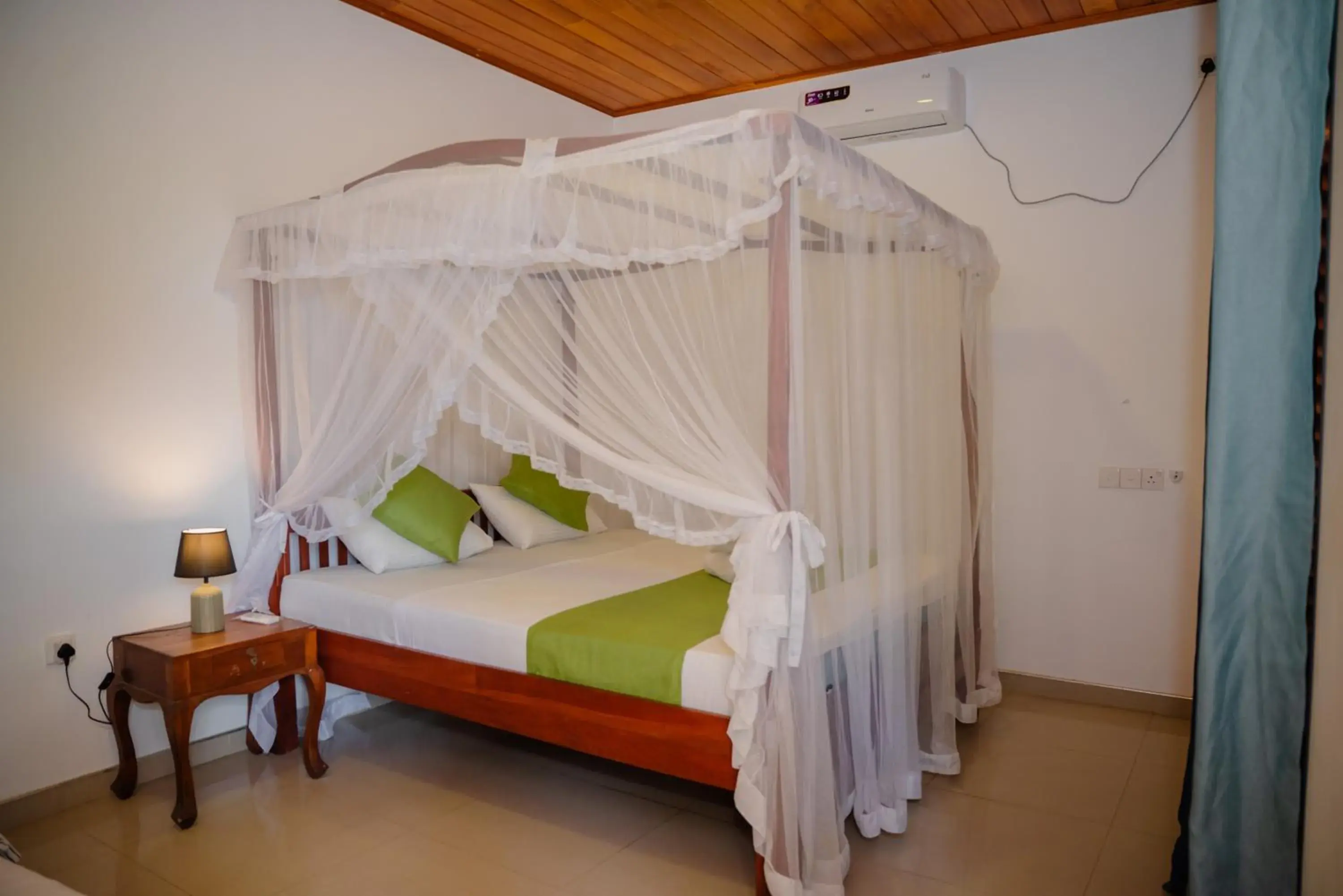 Bed in Shehani Beach Bungalow Bed in Shehani Beach Bungalow