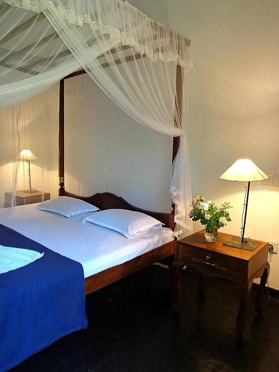 Bed in Shehani Beach Bungalow