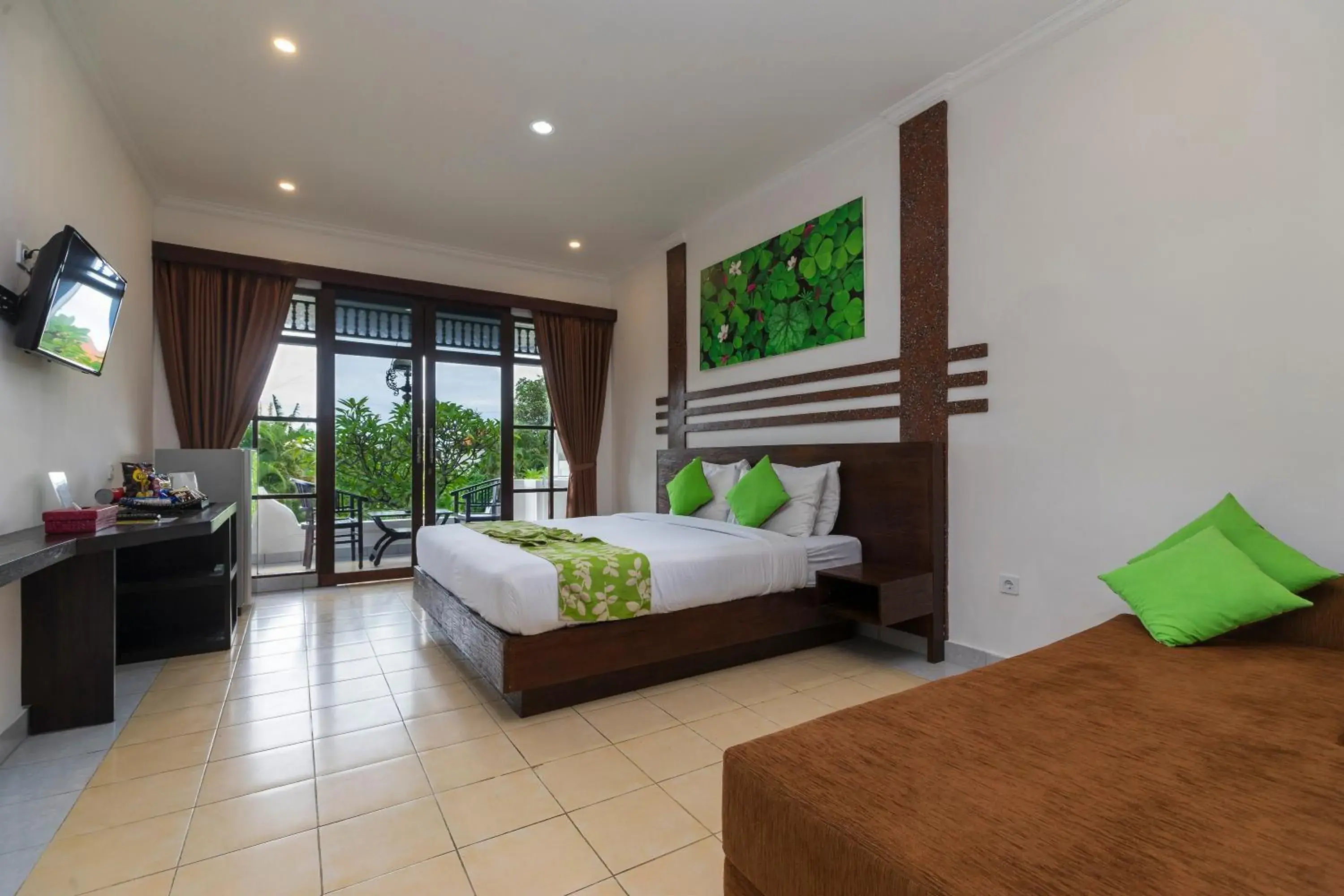 Photo of the whole room, Bed in Bali Wirasana Inn Photo of the whole room, Bed in Bali Wirasana Inn