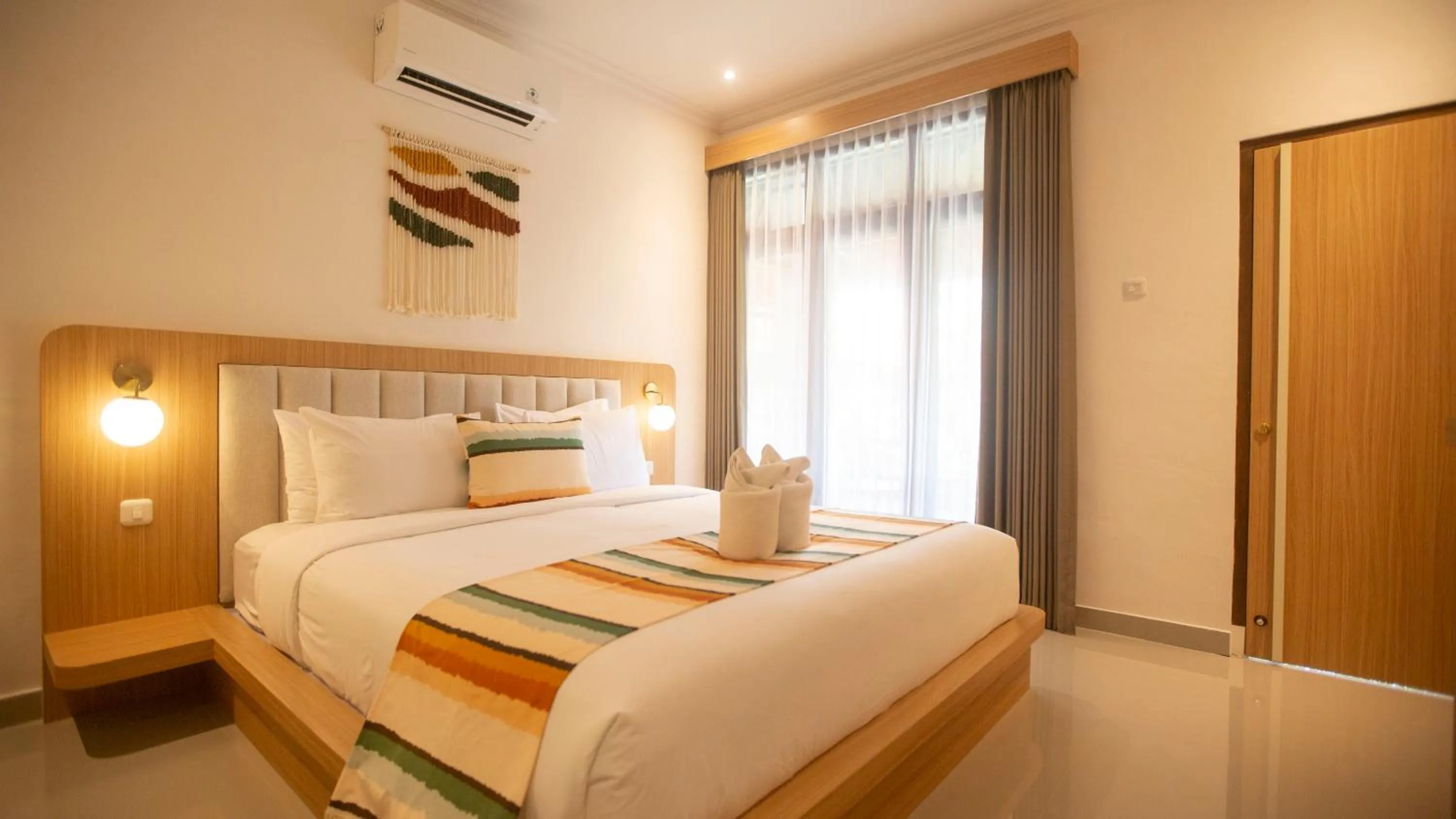 Bedroom, Bed in Bali Wirasana Inn