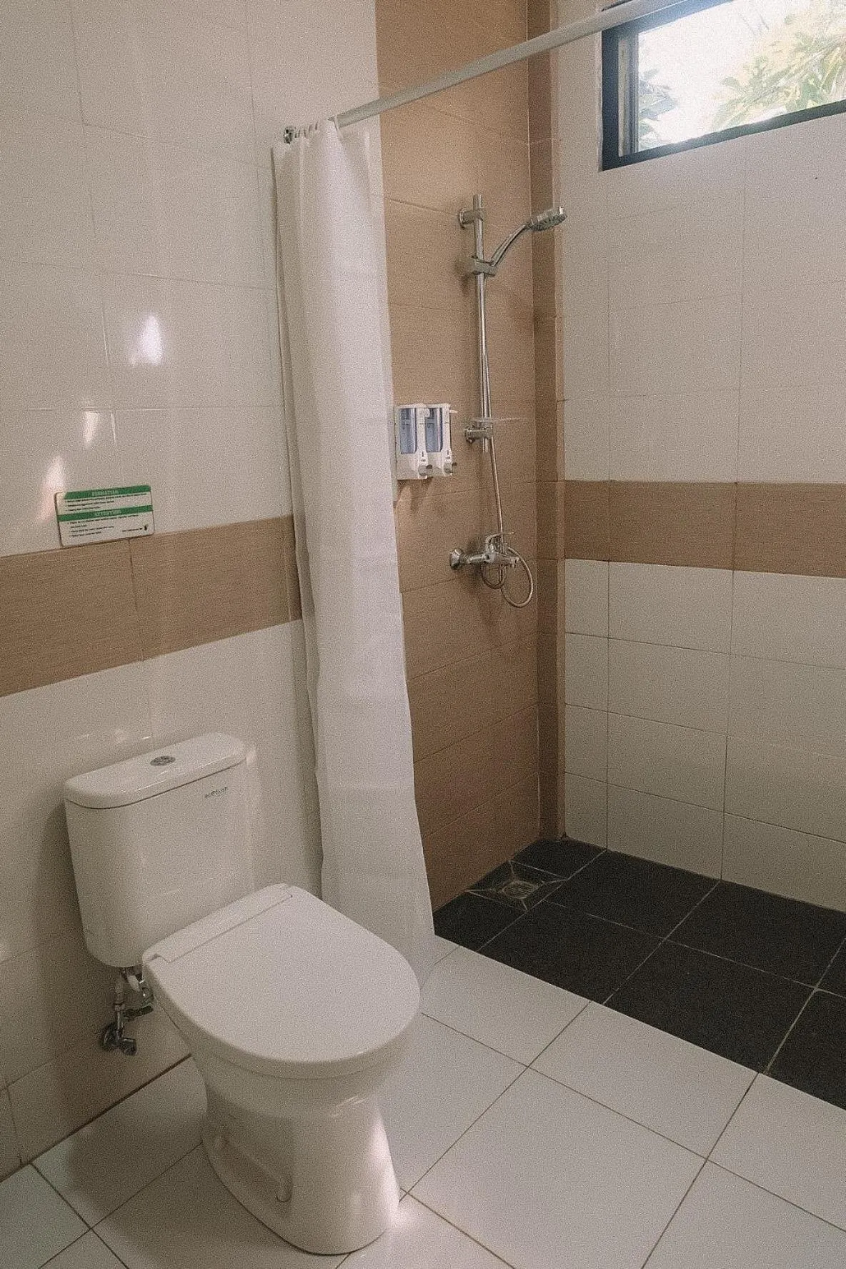 Shower in Bali Wirasana Inn