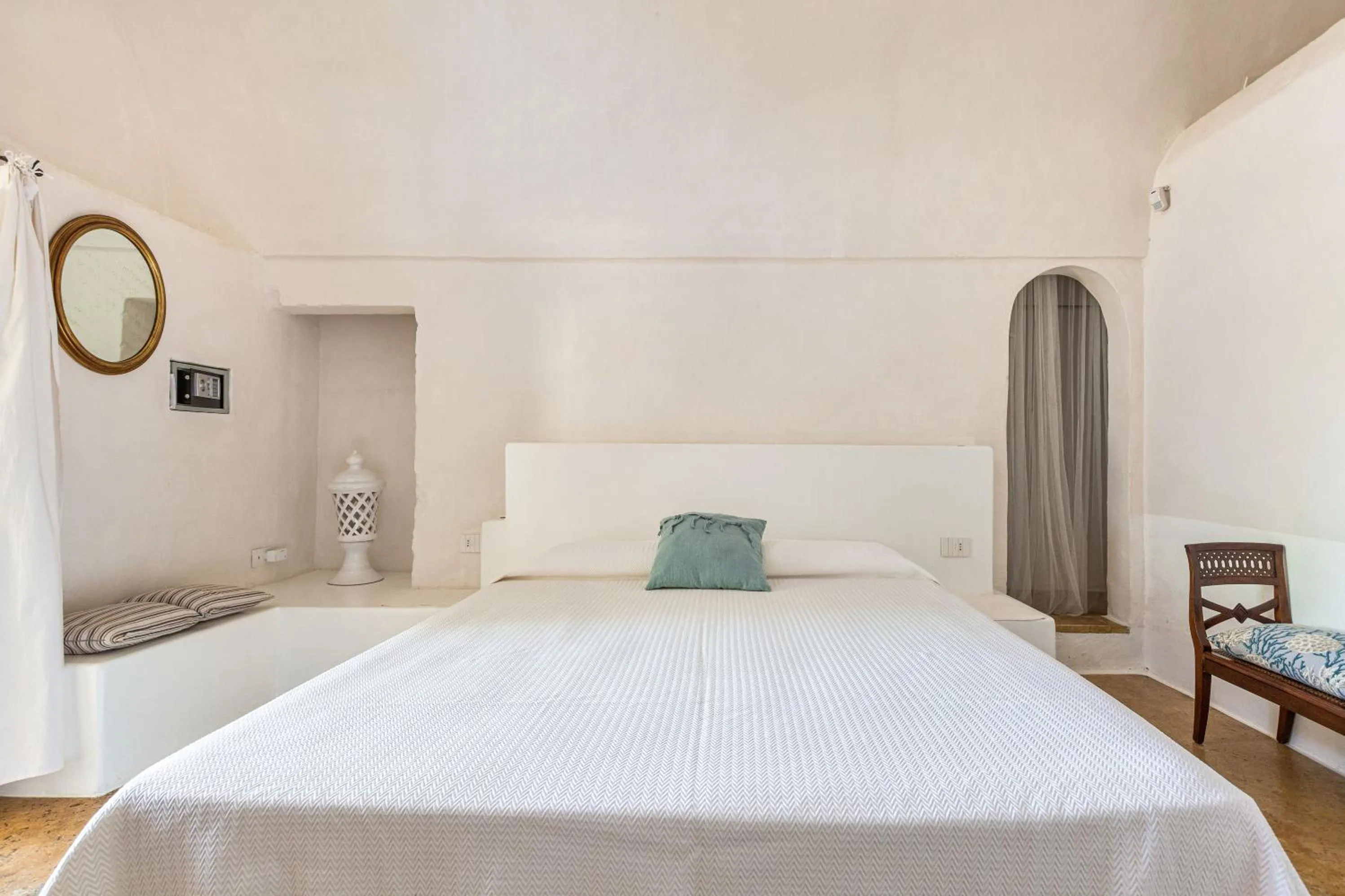 Bed in Masseria Li Capperi by Perle di Puglia