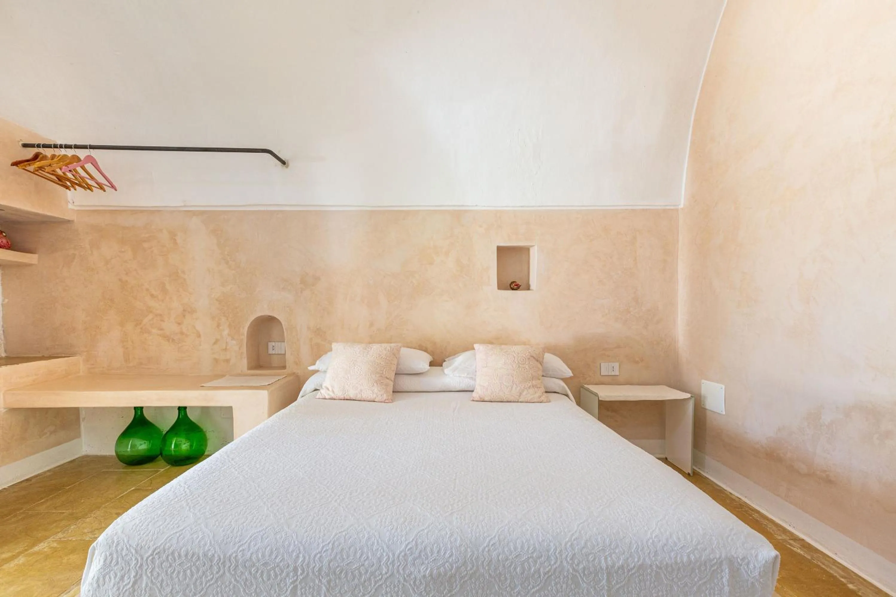 Bed in Masseria Li Capperi by Perle di Puglia