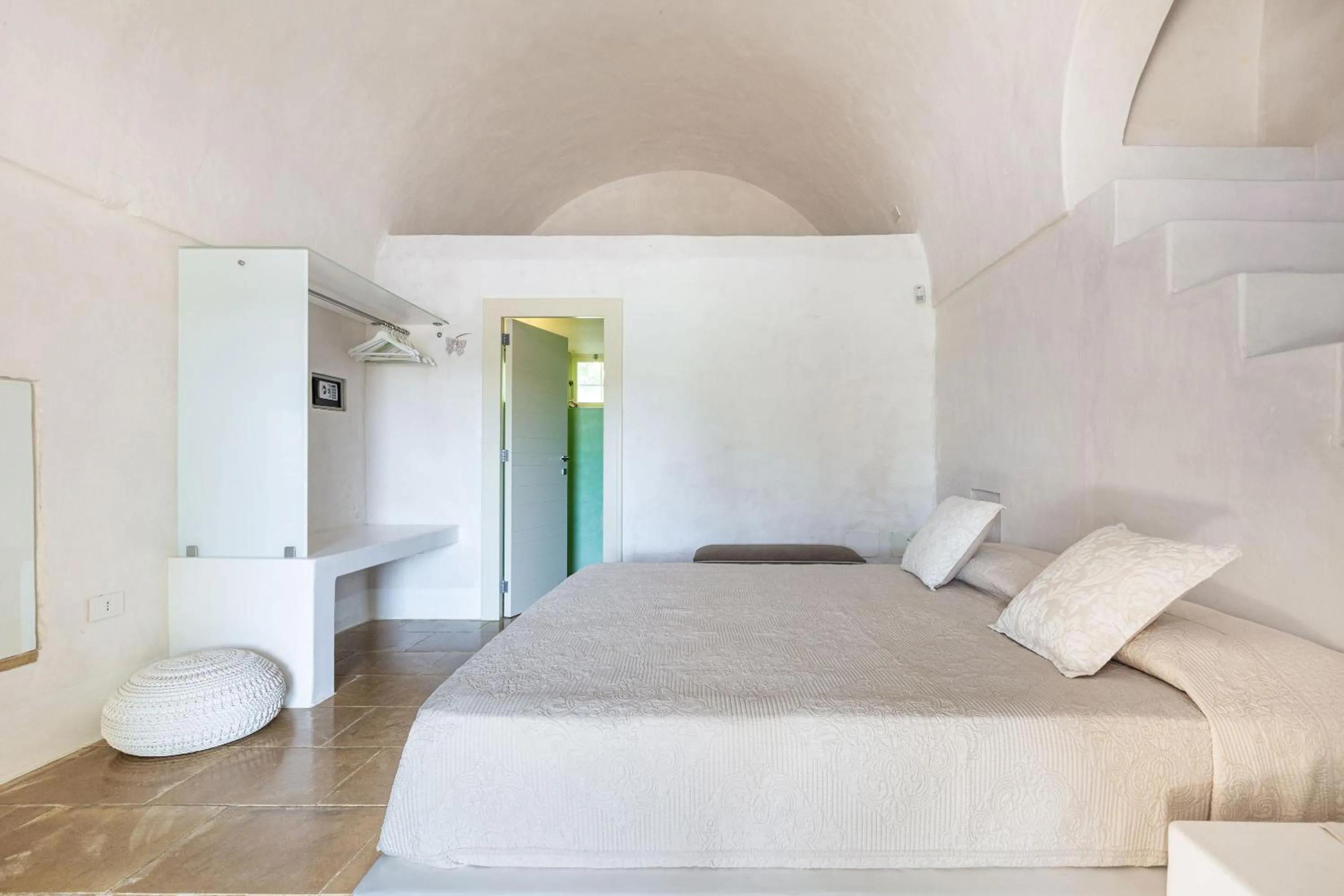 Bed in Masseria Li Capperi by Perle di Puglia