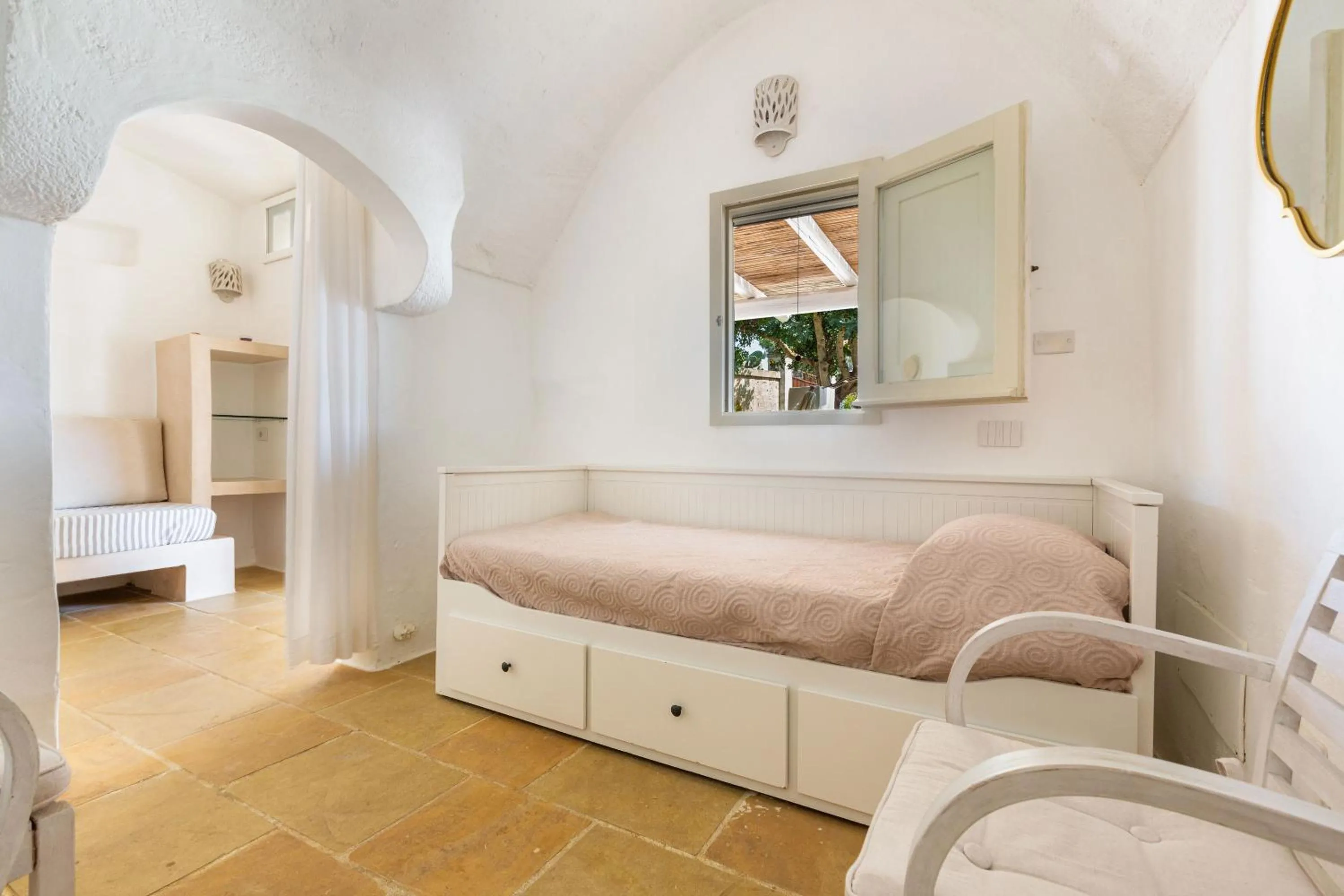 Bed in Masseria Li Capperi by Perle di Puglia