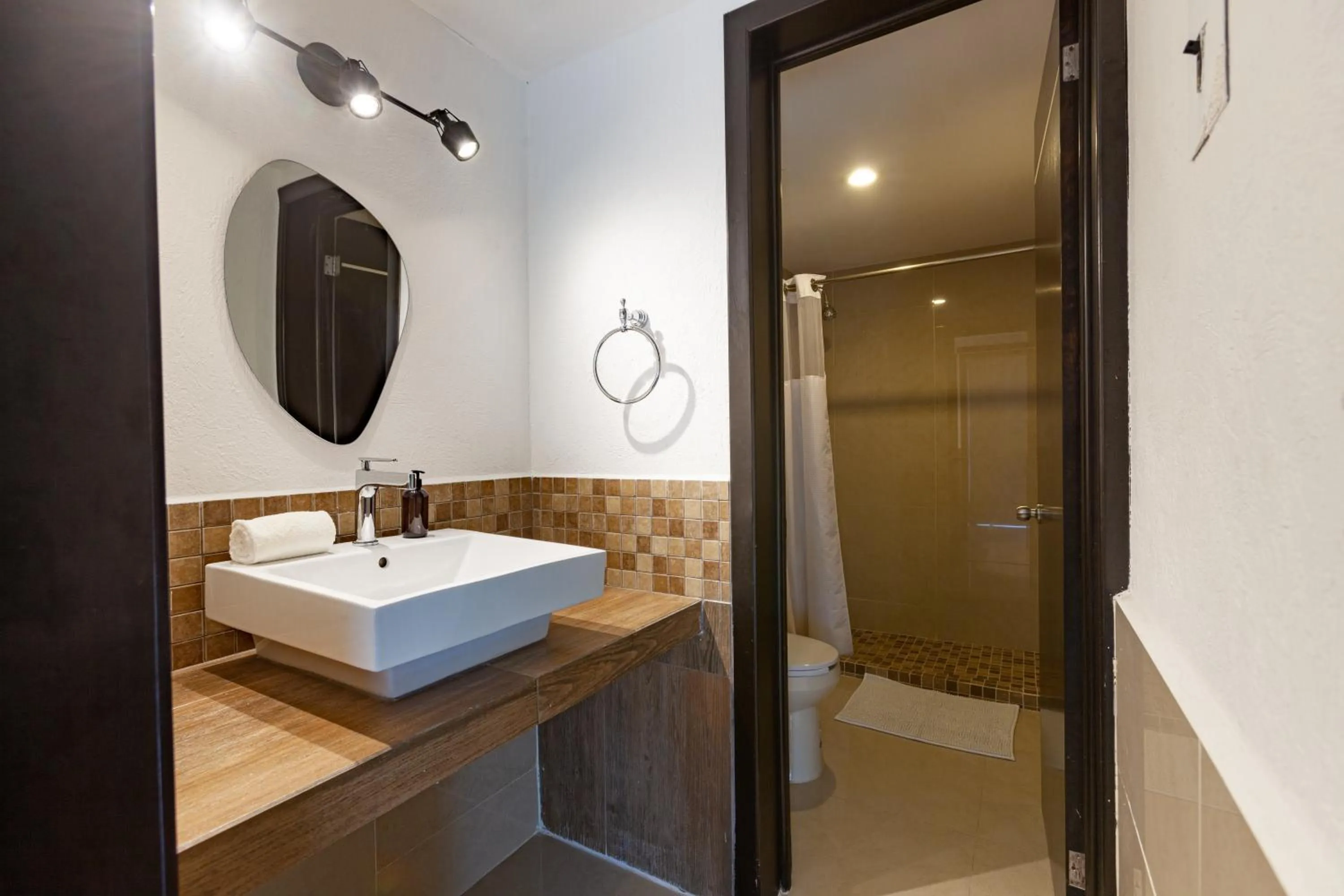 Shower in Via Tendenza Condos