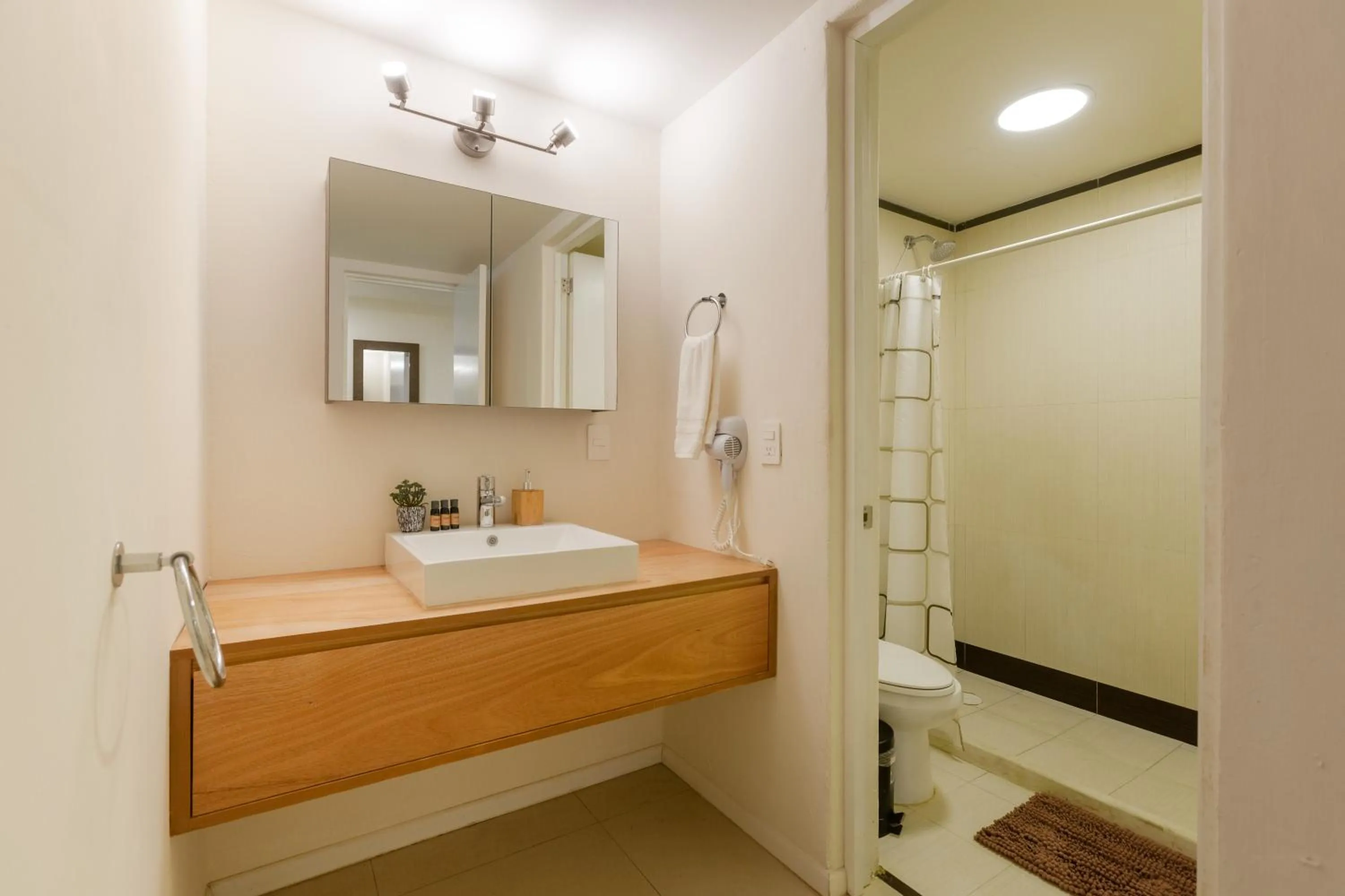 Shower in Via Tendenza Condos