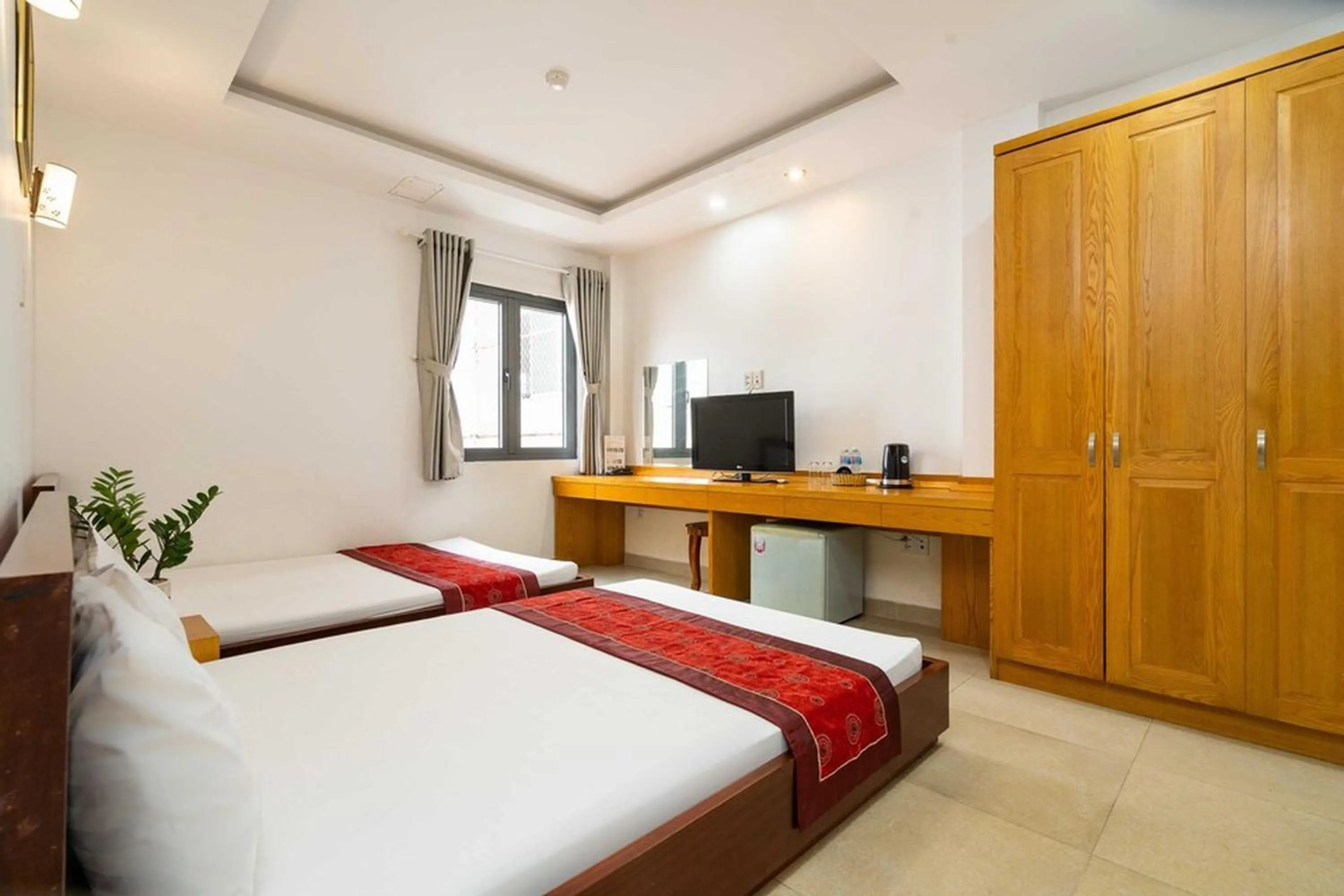 Deluxe Family Room in Hoa Trang An Hotel