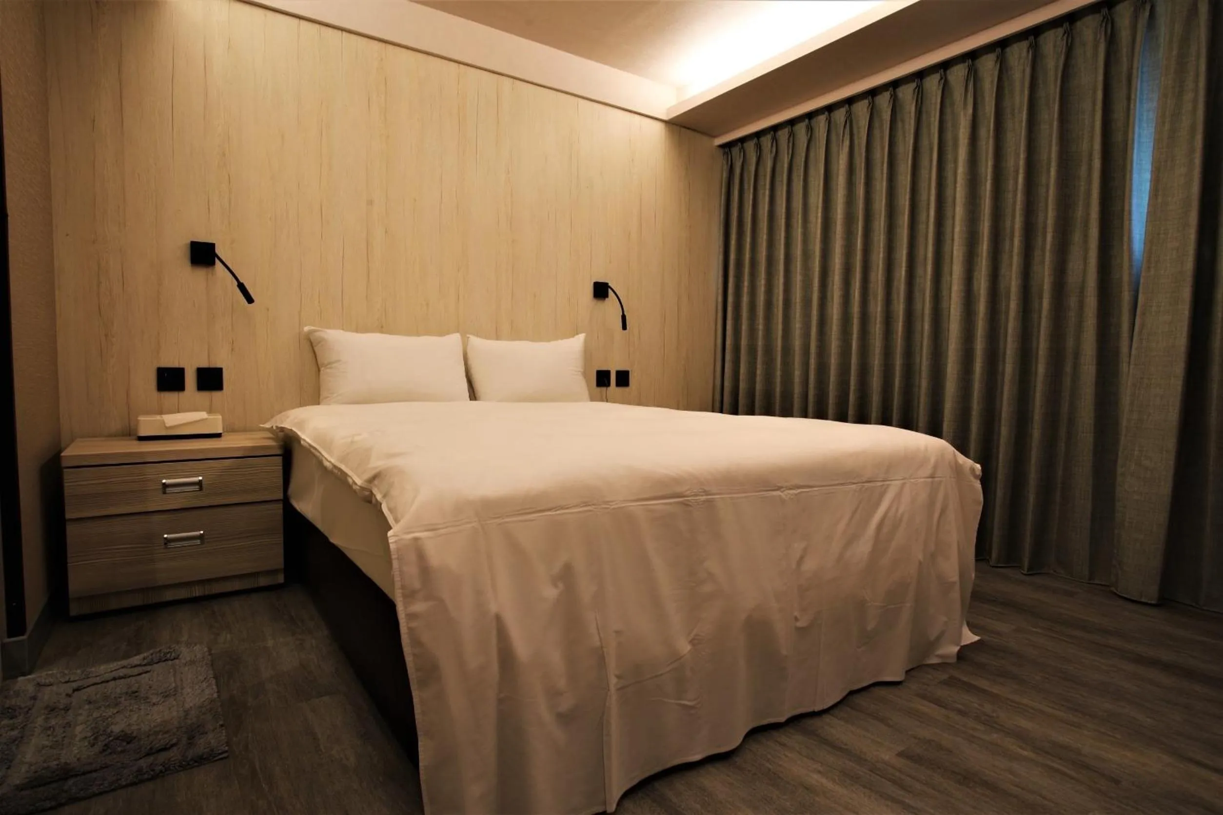 Bed in Golden Home Hotel