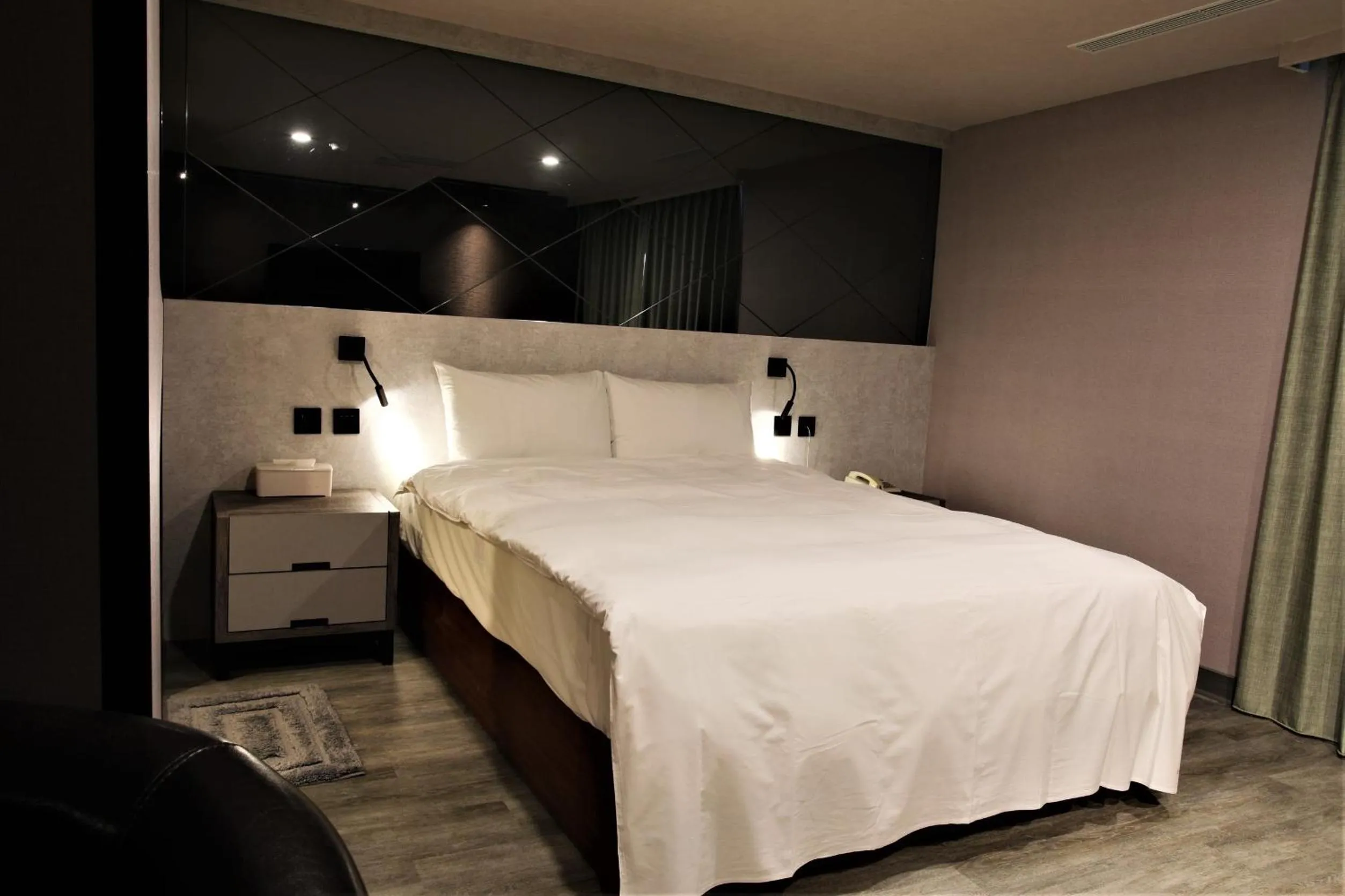 Bed in Golden Home Hotel