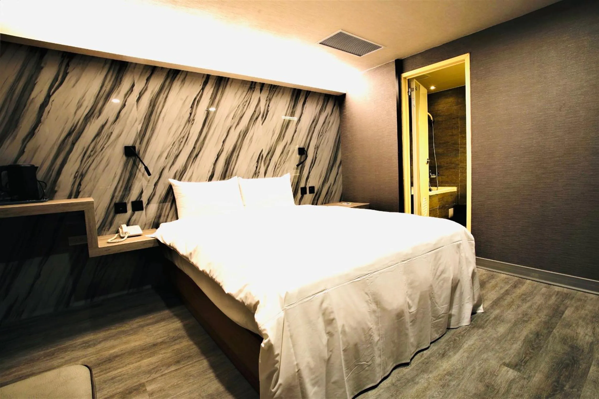 Bed in Golden Home Hotel