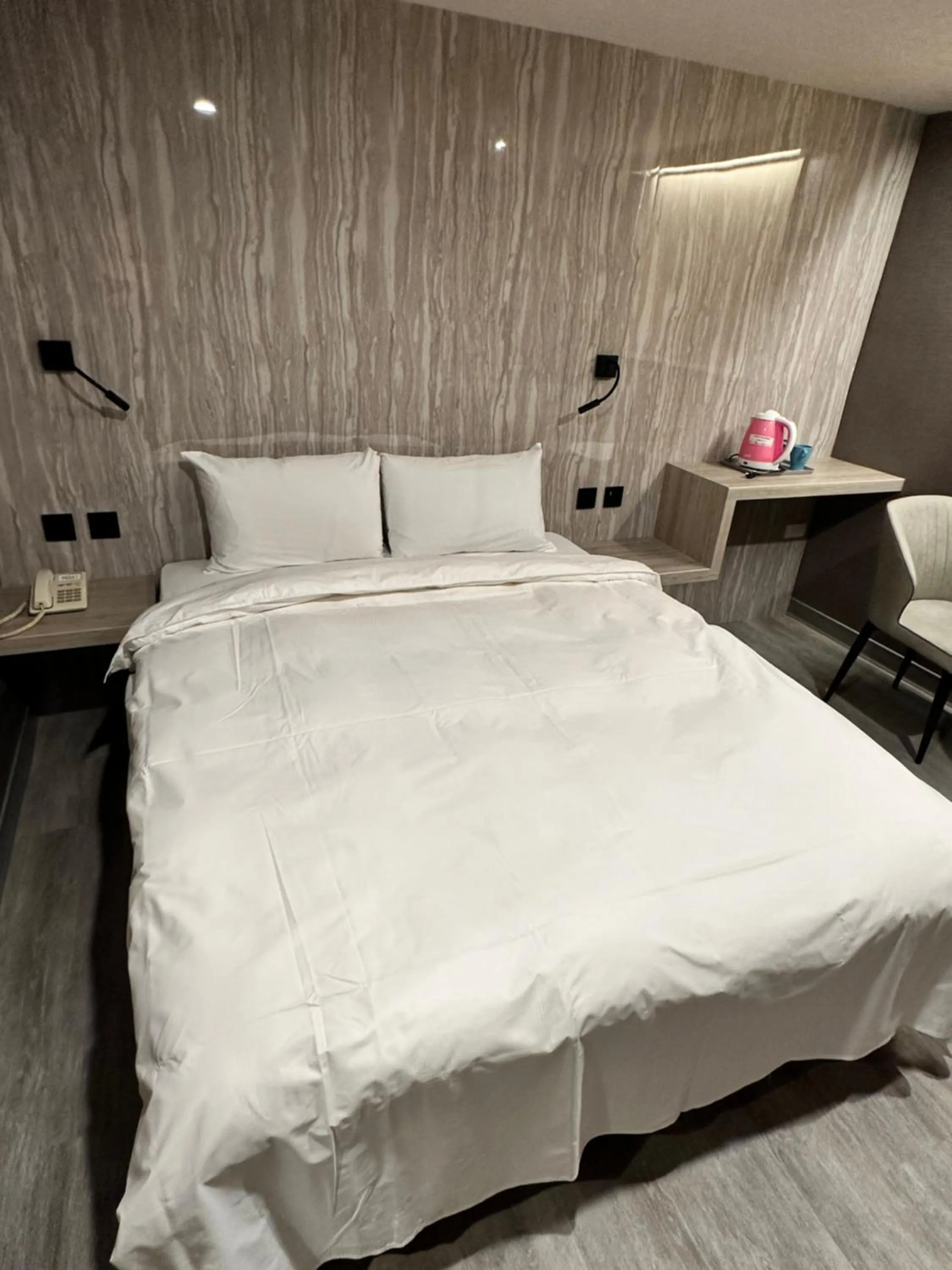 Bed in Golden Home Hotel