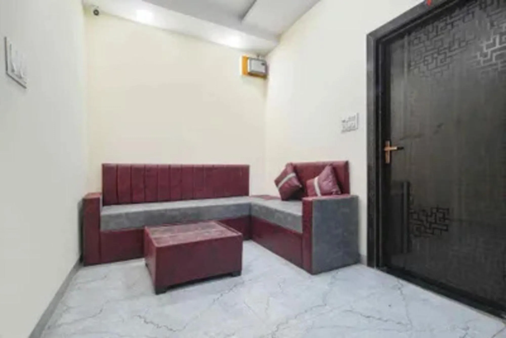 Seating area in FabHotel Devs Inn