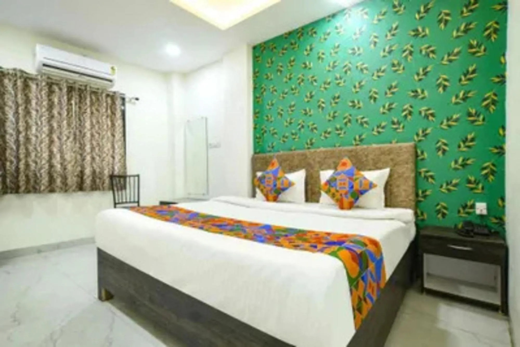 Bed in FabHotel Devs Inn