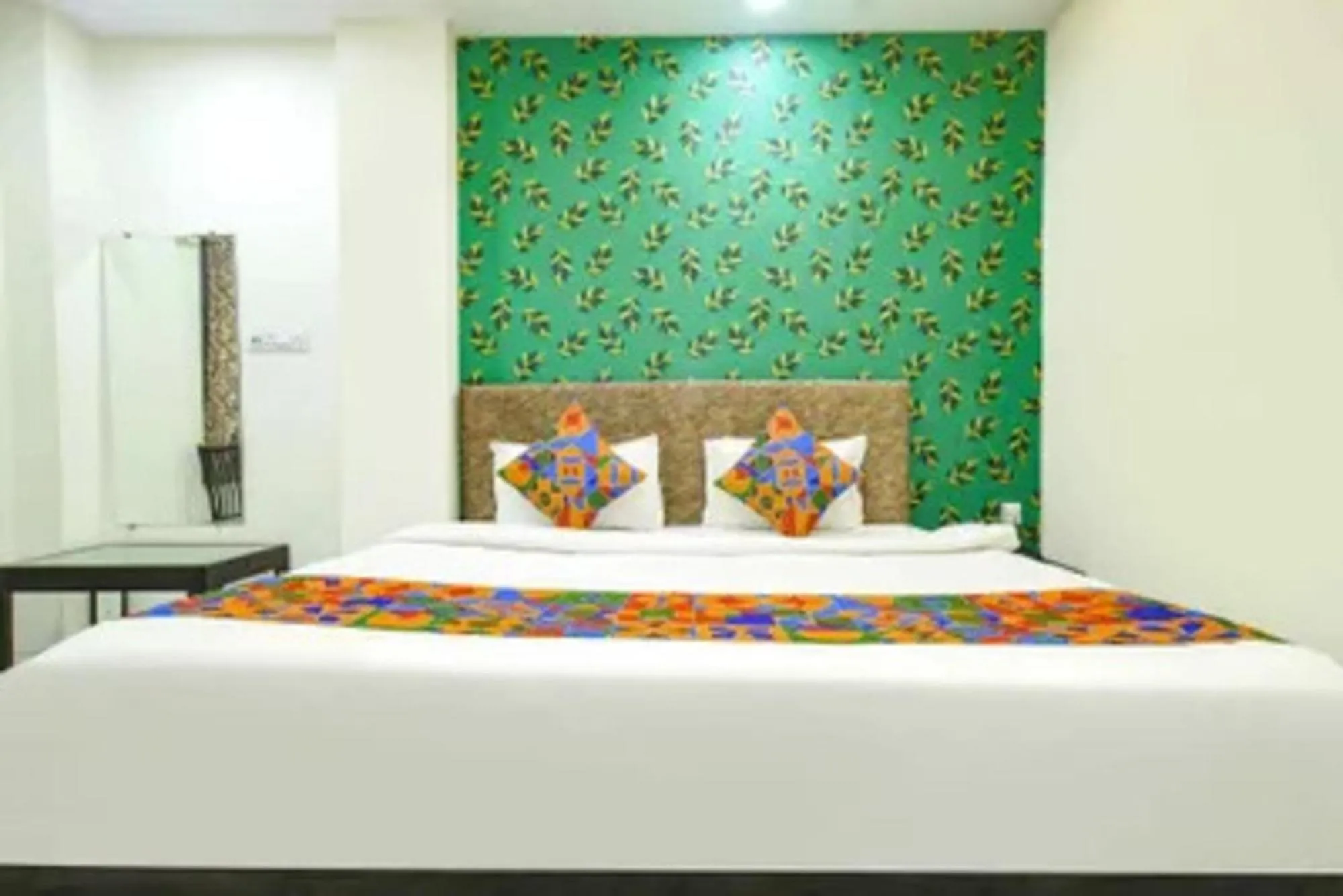 Bed in FabHotel Devs Inn