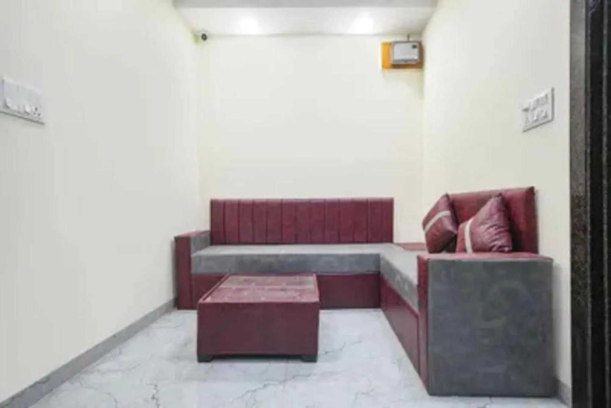 Seating area in FabHotel Devs Inn