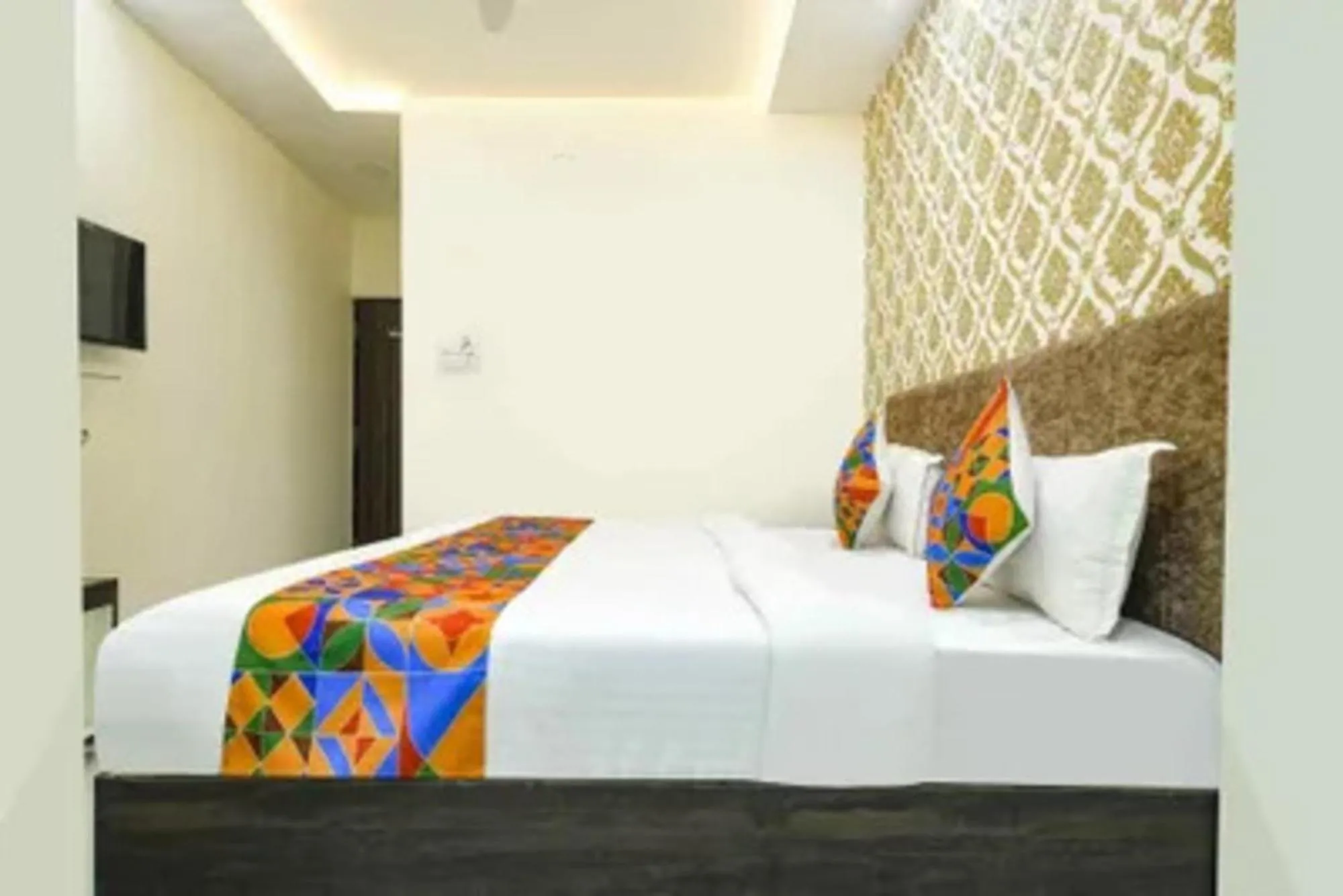 Bed in FabHotel Devs Inn