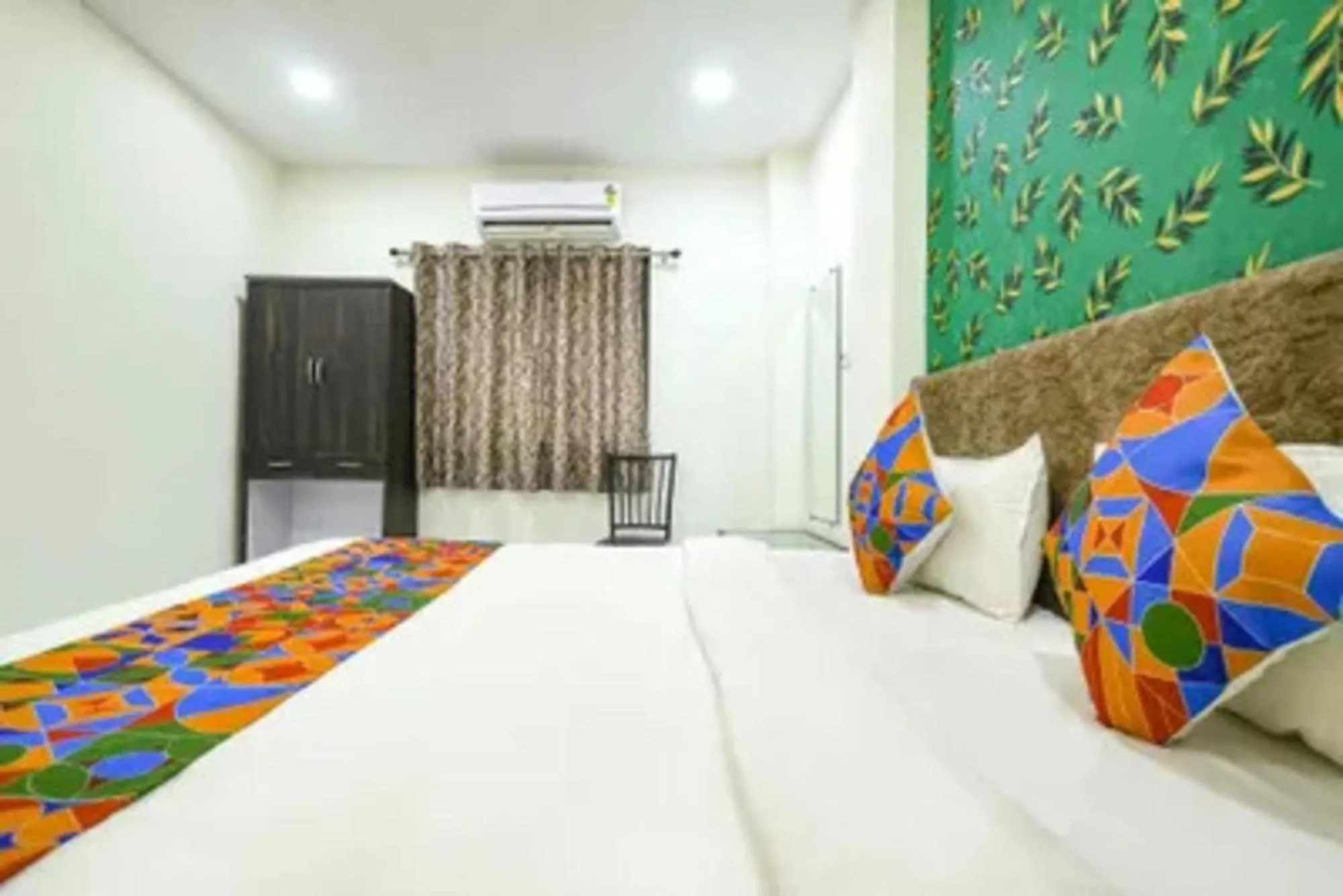 Bed in FabHotel Devs Inn