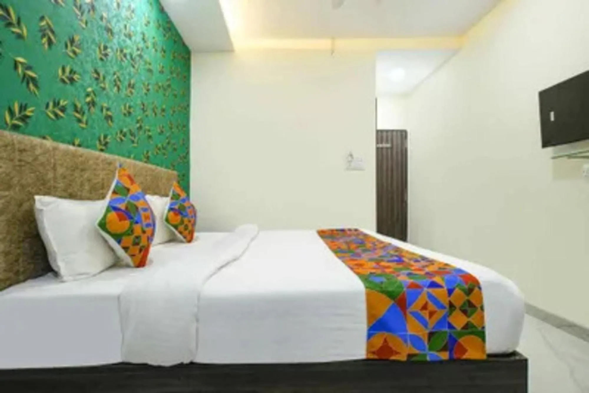 Bed in FabHotel Devs Inn