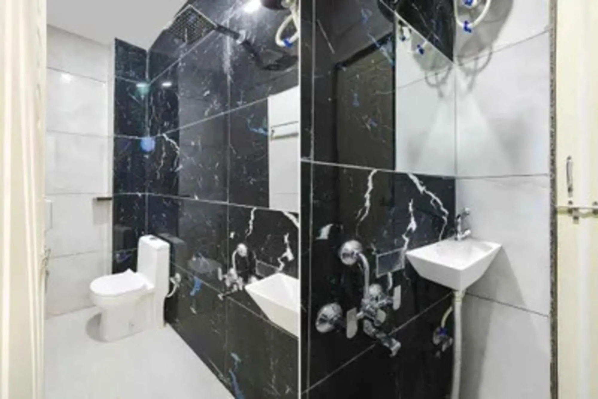 Bathroom in FabHotel Devs Inn