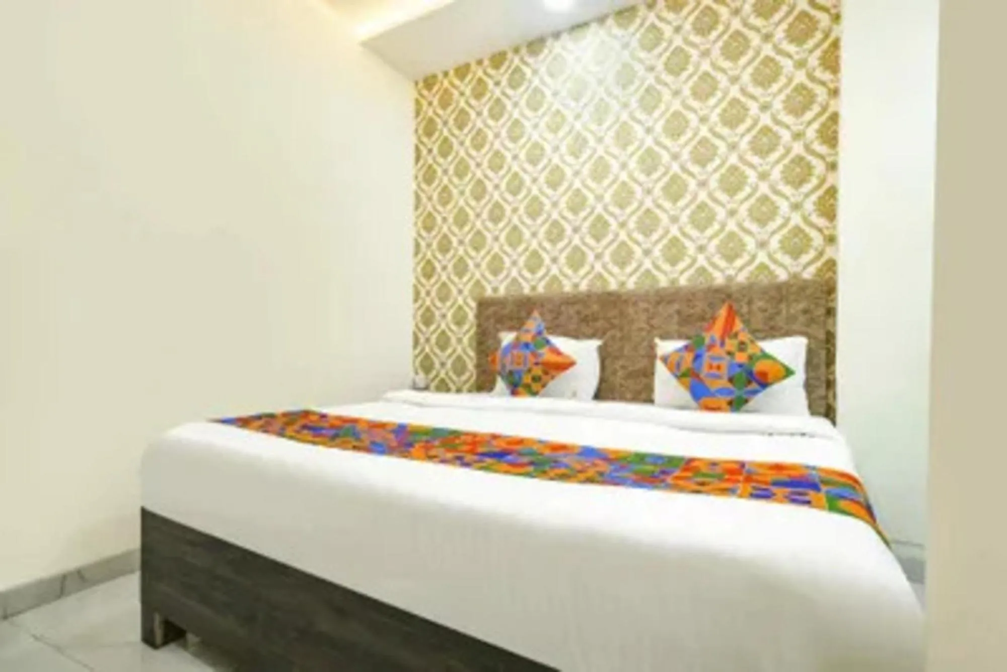 Bed in FabHotel Devs Inn