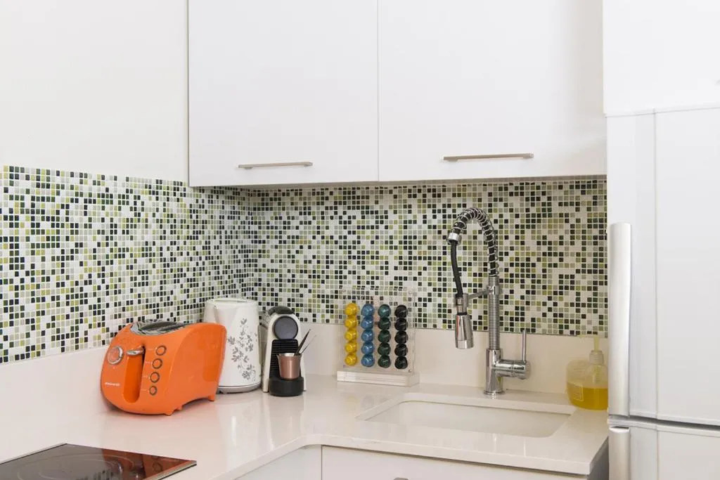 Kitchen or kitchenette in Allenby 36 Bauhaus Residence 5 Stars